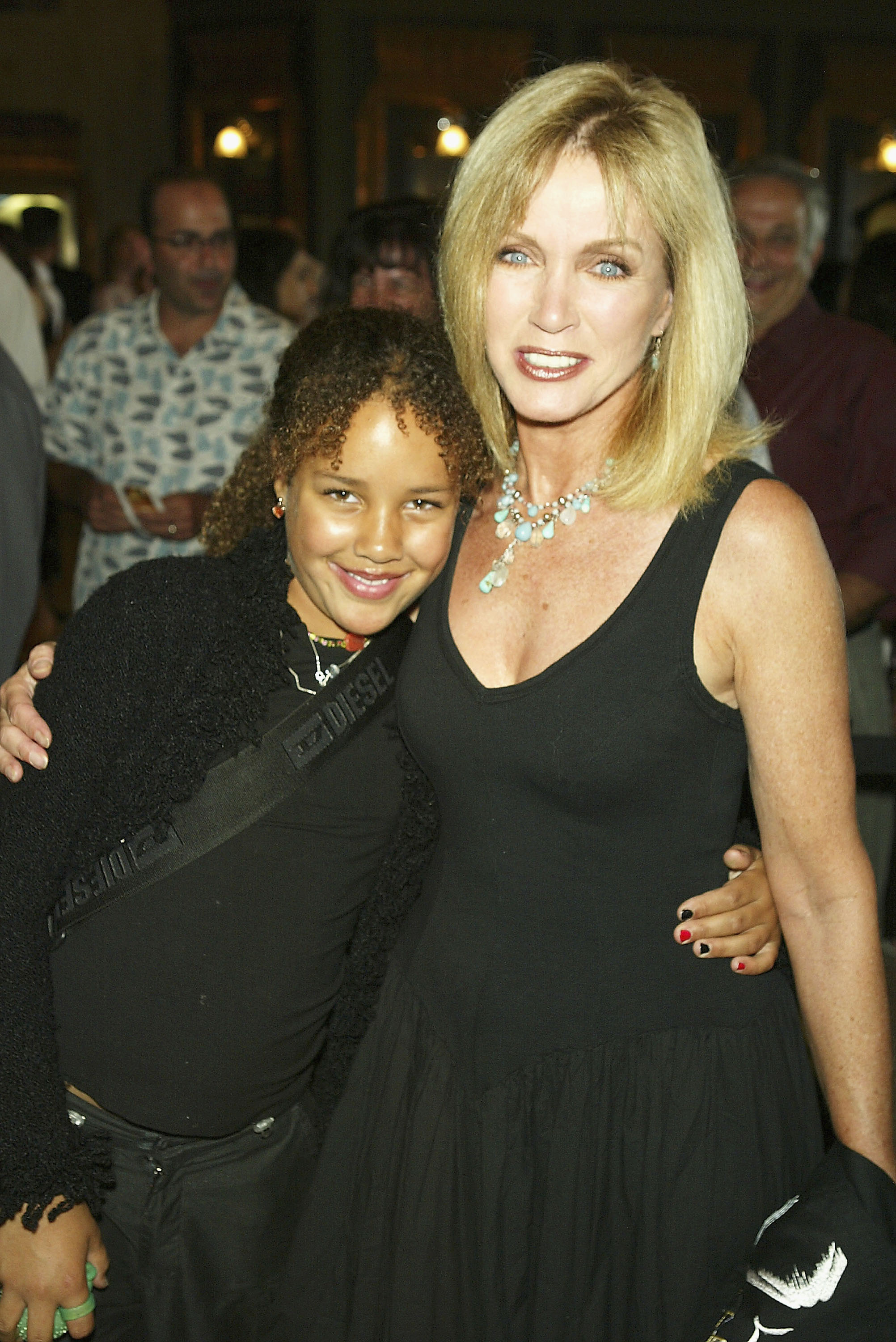 Chloe and Donna Mills at the Los Angeles opening of "Mamma Mia!" on April 25, 2004, in Hollywood, California. | Source: Getty Images