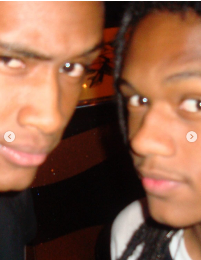 A close-up, slightly grainy selfie of the McKnight brothers, Niko and Brian Jr., pressed close to the camera, from a post dated September 28, 2025. | Source: Instagram/itsjuliemcknight