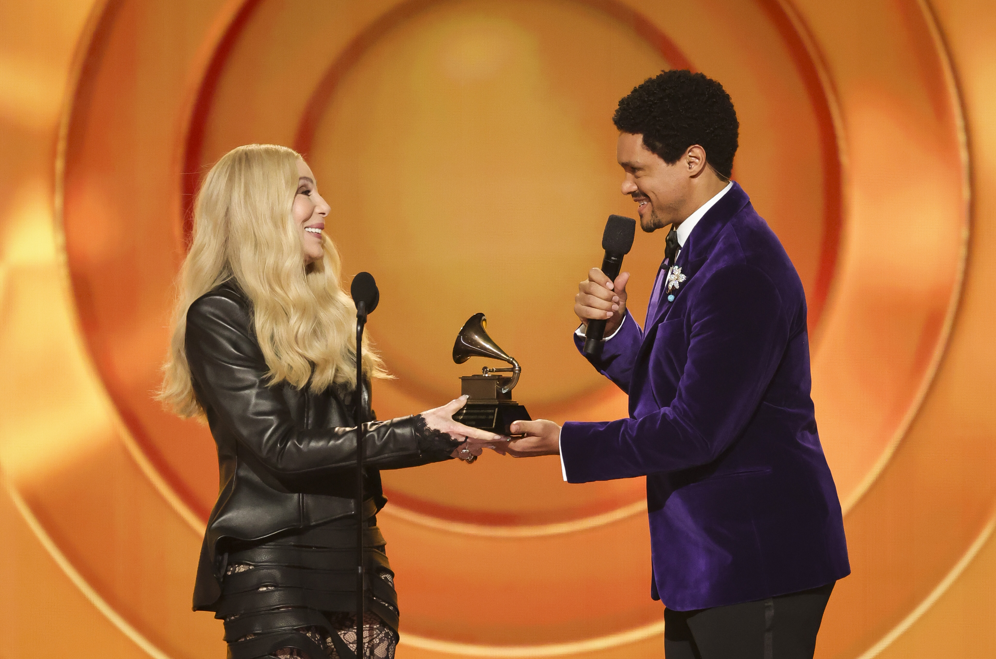 Cher and host Trevor Noah onstage during the 68th Annual Grammy Awards on February 1, 2026 | Source: Getty Images