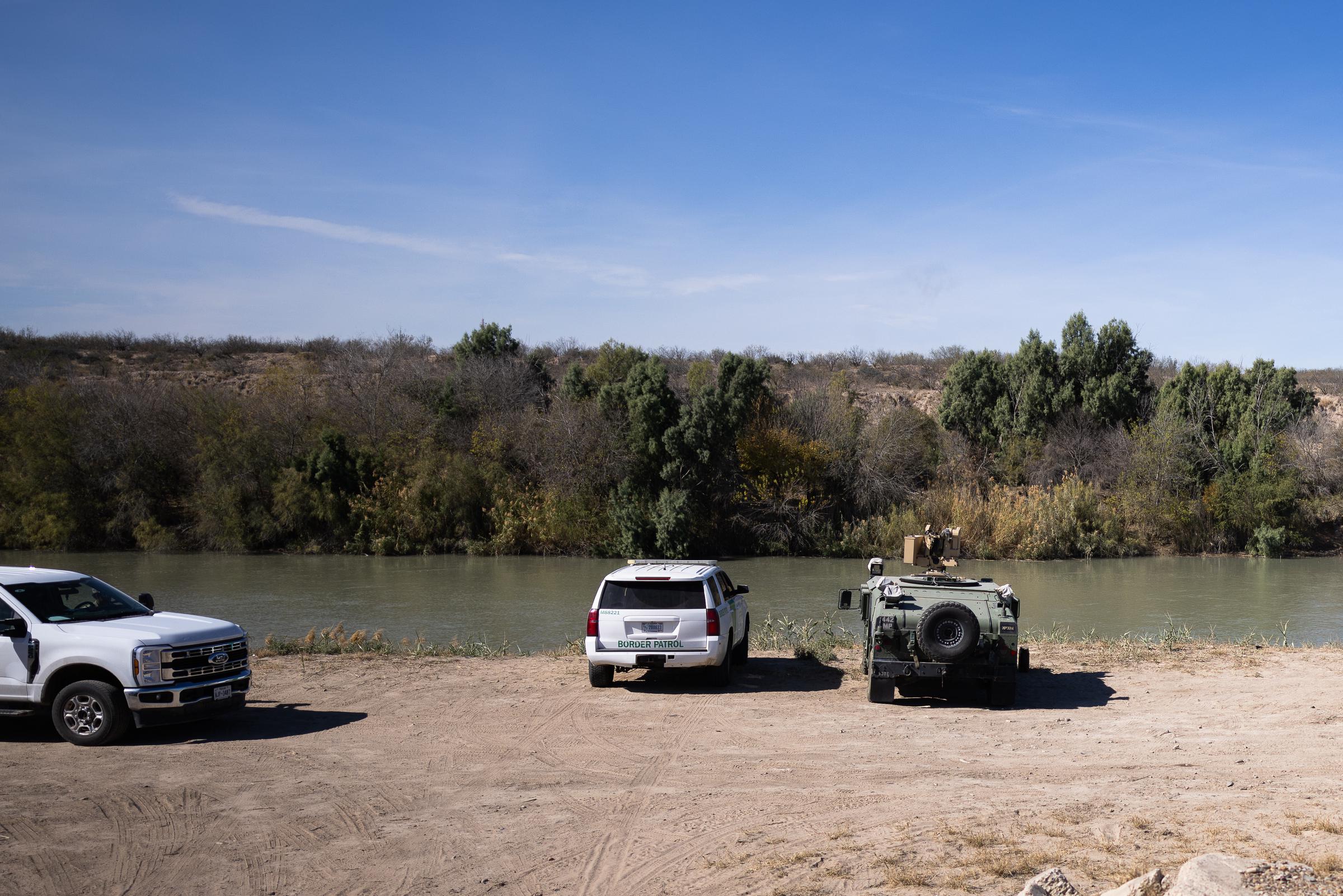 Border Patrol officers overlook the Rio Grande River in Laredo, Texas. | Source: Getty Images