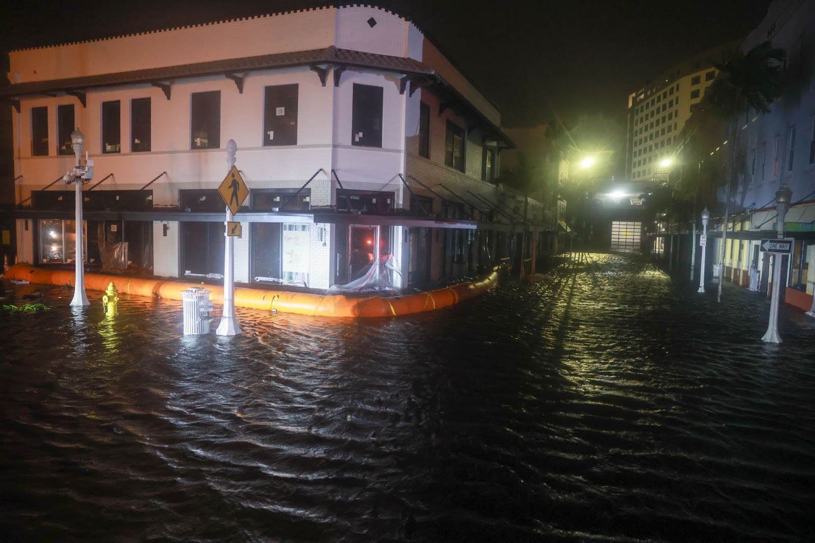 Surge waters flooding the street after Hurricane Milton made landfall in the Sarasota area on October 9, 2024, in Fort Myers, Florida. | Source: Getty Images