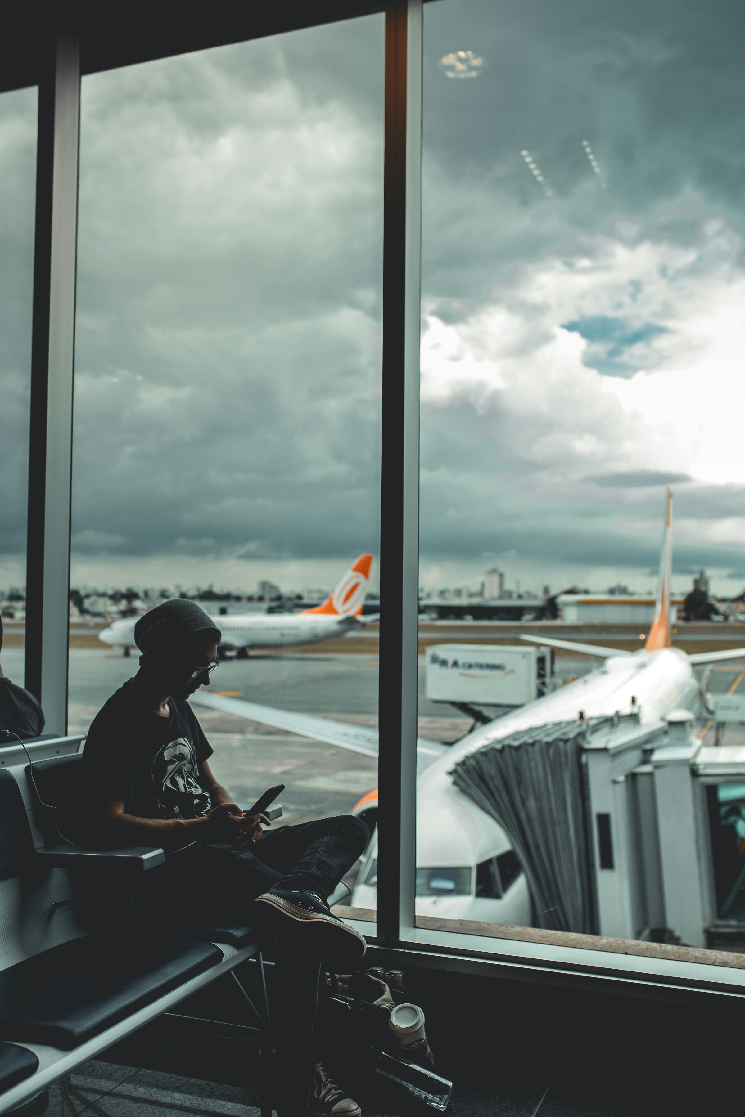 A person sitting at the airport | Source: Unsplash
