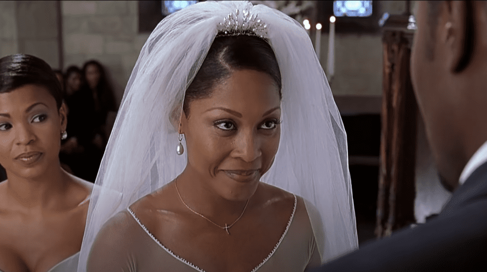 Monica Calhoun acting as Mia from a scene from "The Best Man" | Photo: YouTube/movieclips