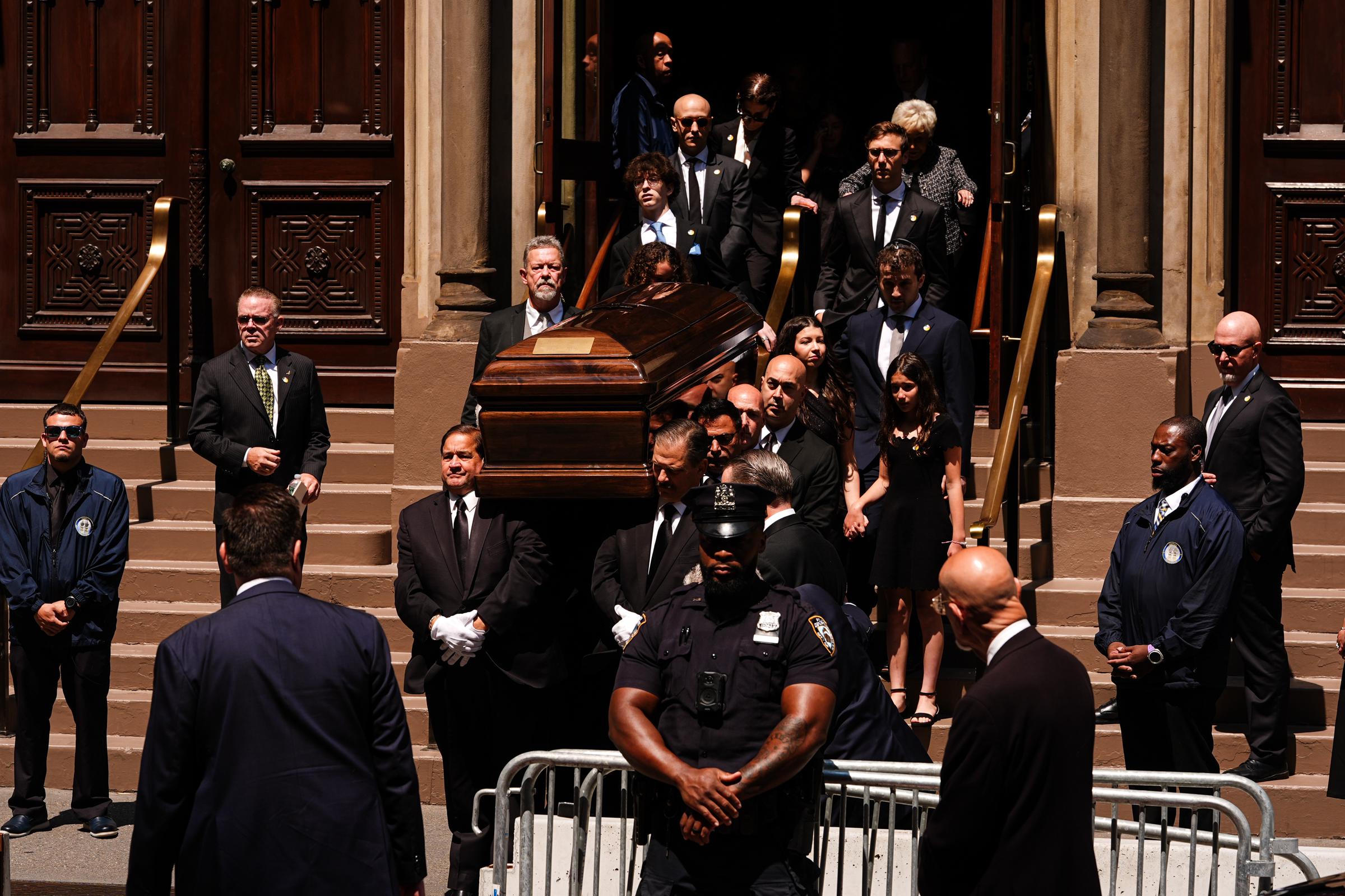 Clive Davis' family carried the legendary music executive's casket from Central Synagogue following an emotional funeral attended by artists, loved ones, and industry leaders. | Source: Getty Images