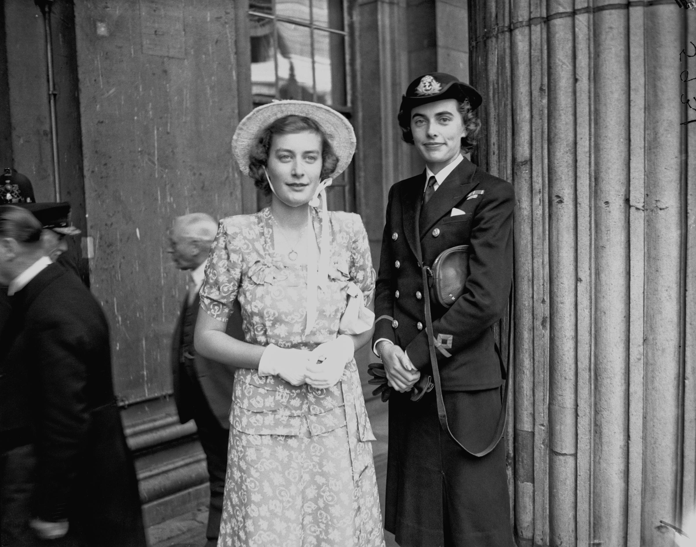 Captured on 10 July 1946 at Mansion House in London, Pamela Mountbatten, later Lady Pamela Hicks, stands beside her sister, Patricia Mountbatten, as they accompany their father, Lord Louis Mountbatten, during his Freedom of the City ceremony, with Patricia notably dressed in her Women's Royal Naval Service uniform following her recent demobilisation.