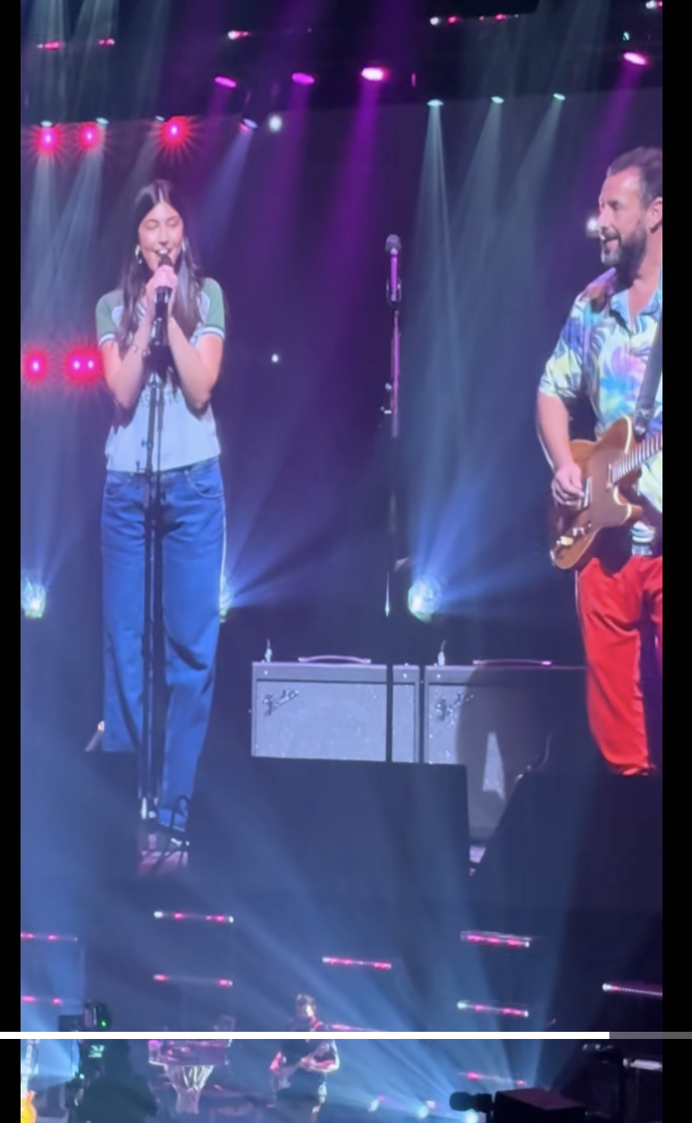 Adam and Sunny Sandler are pictured performing onstage, dated October 7, 2025 | Source: TikTok/burntknee00