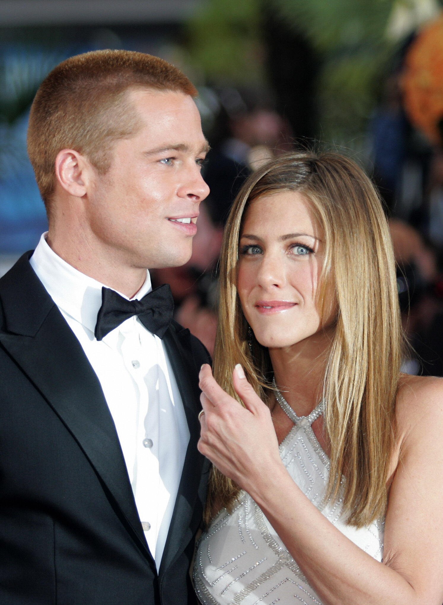 Brad Pitt and his wife Jennifer Aniston attend the official projection of the film "Troy" at the 57th Cannes Film Festival on May 13, 2004 in the French Riviera town. | Source: Getty Images
