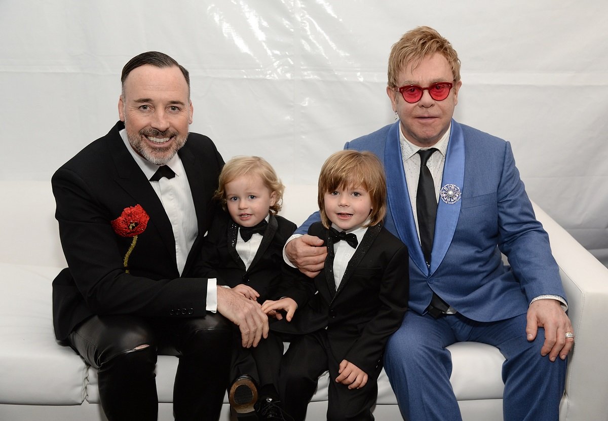 David Furnish, Elton John and their two children on February 22, 2015 in Los Angeles, California | Source: Getty Images