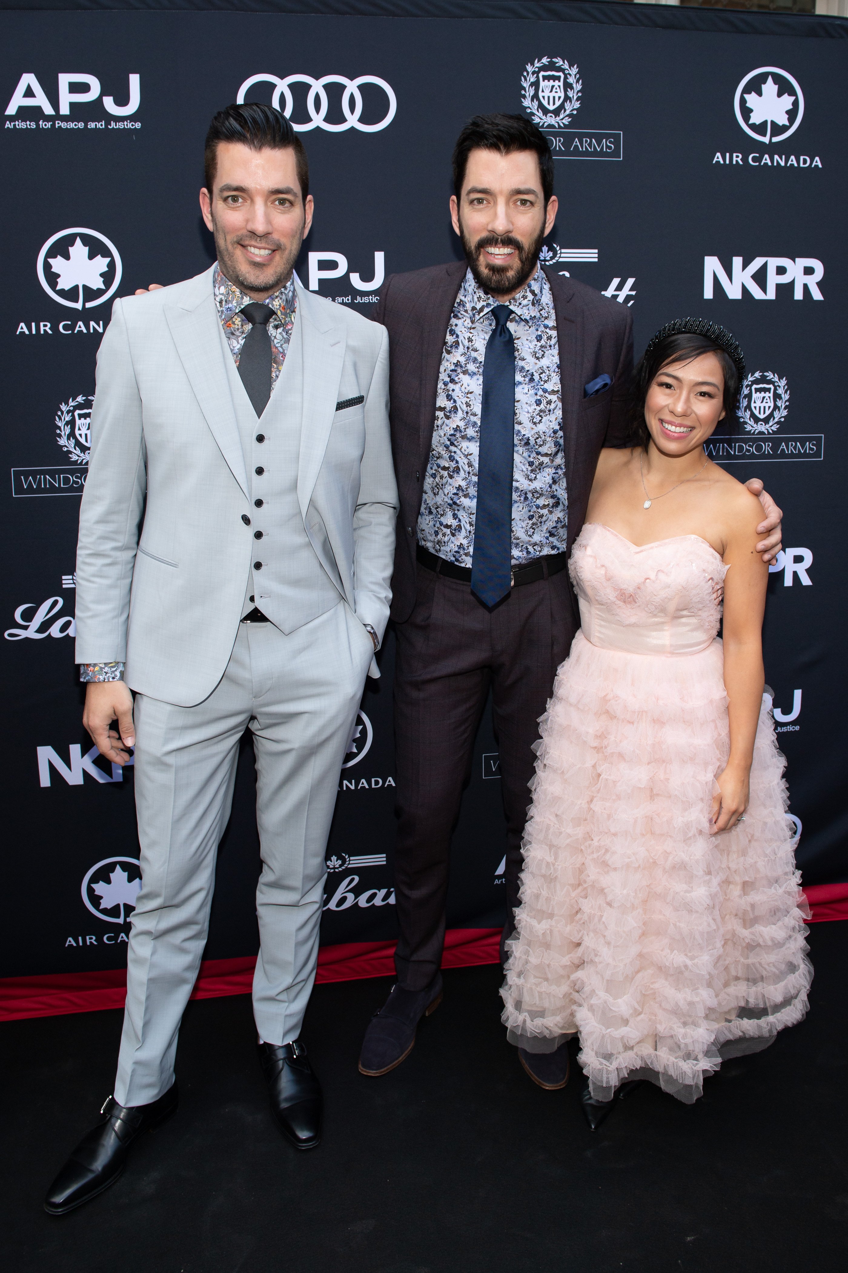 Jonathan and Drew Scott with Linda Phan at the 11th APJ Festival Gala on September 7, 2019, in Toronto, Canada. | Source: Ryan Emberley/Getty Images