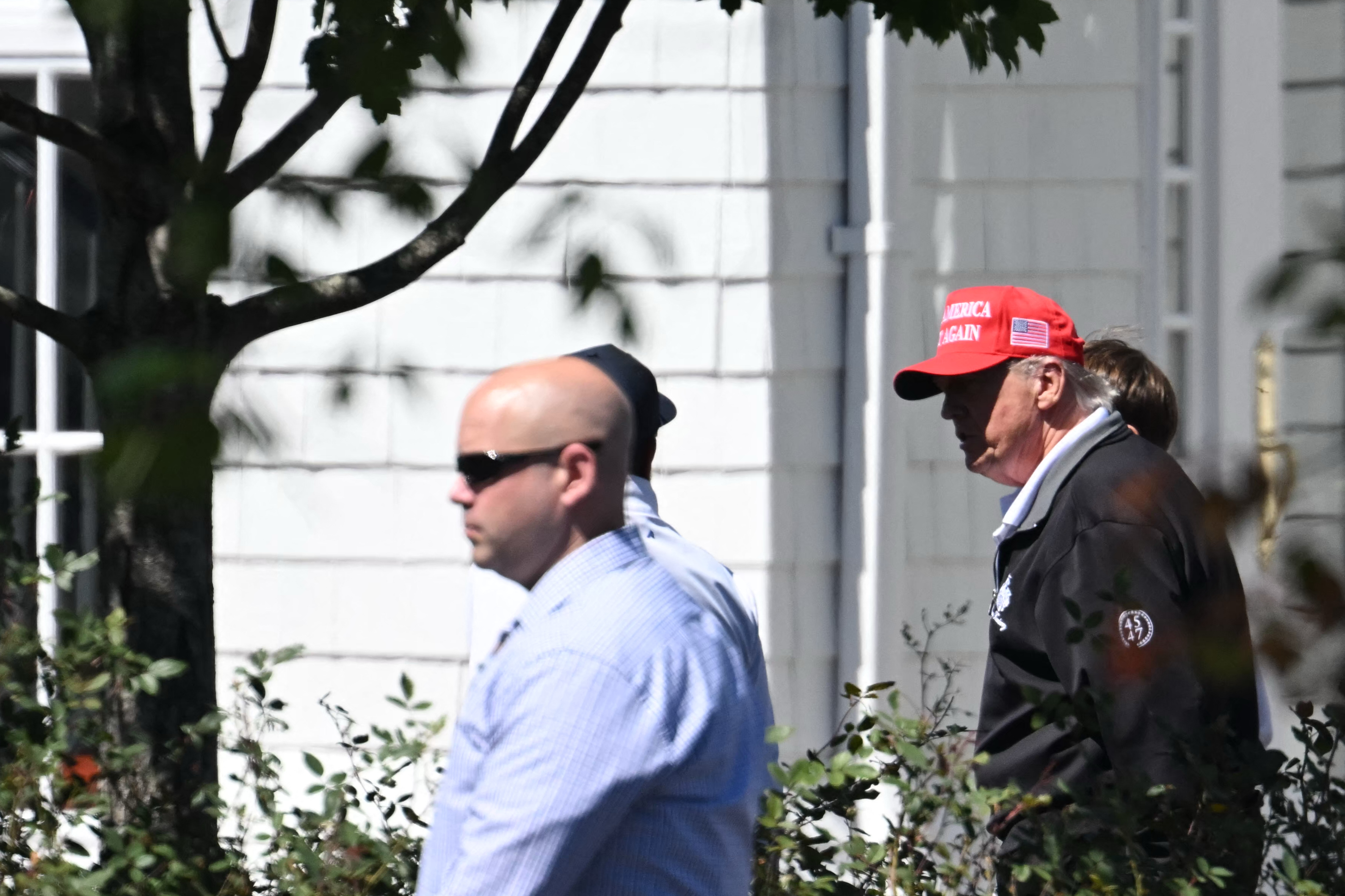 Donald and Spencer Frederick Trump at Trump National golf course in Sterling, Virginia, on August 30, 2025. | Source: Getty Images