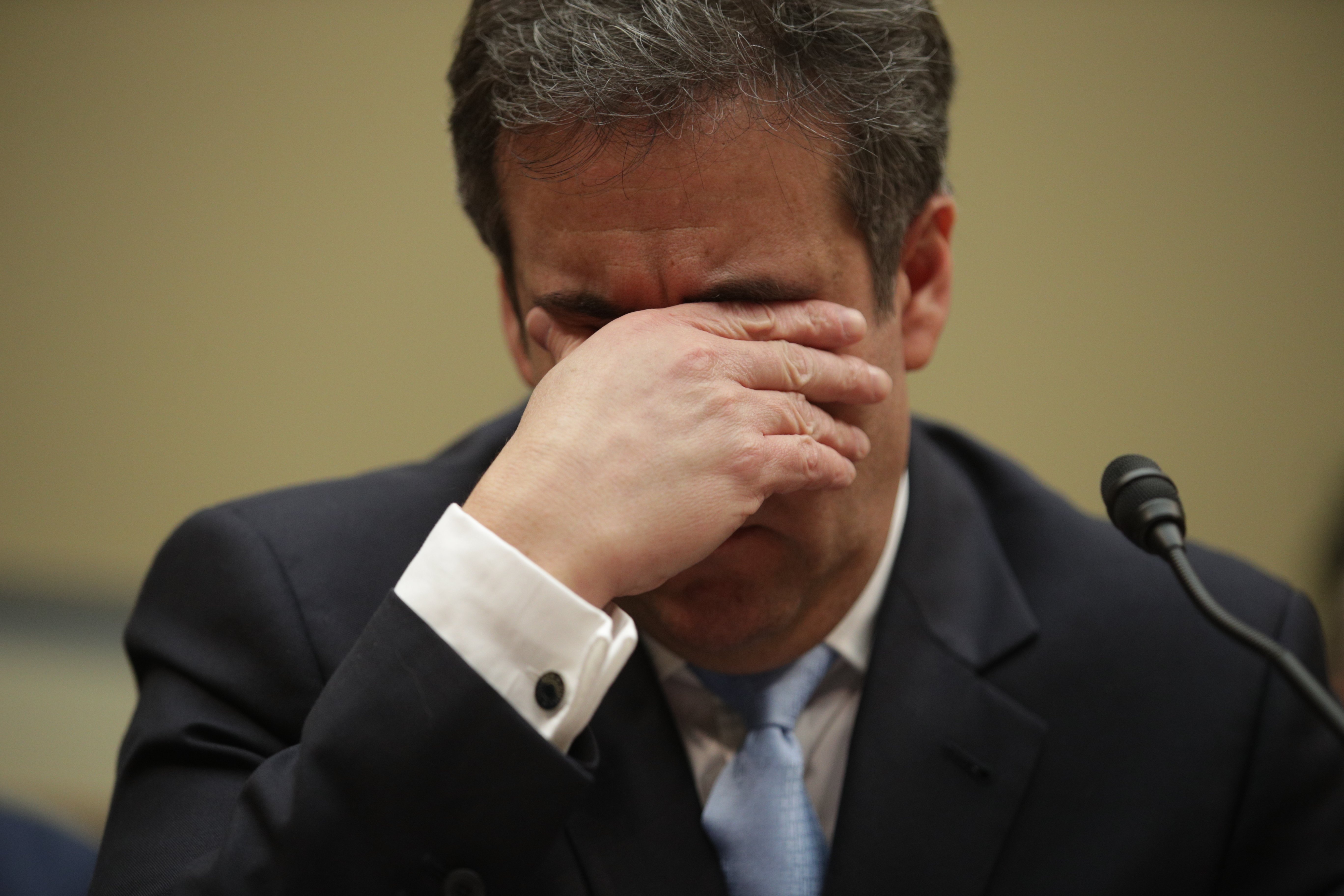 Michael Cohen getting emotional before the House Oversight Committee | Photo: Getty Images