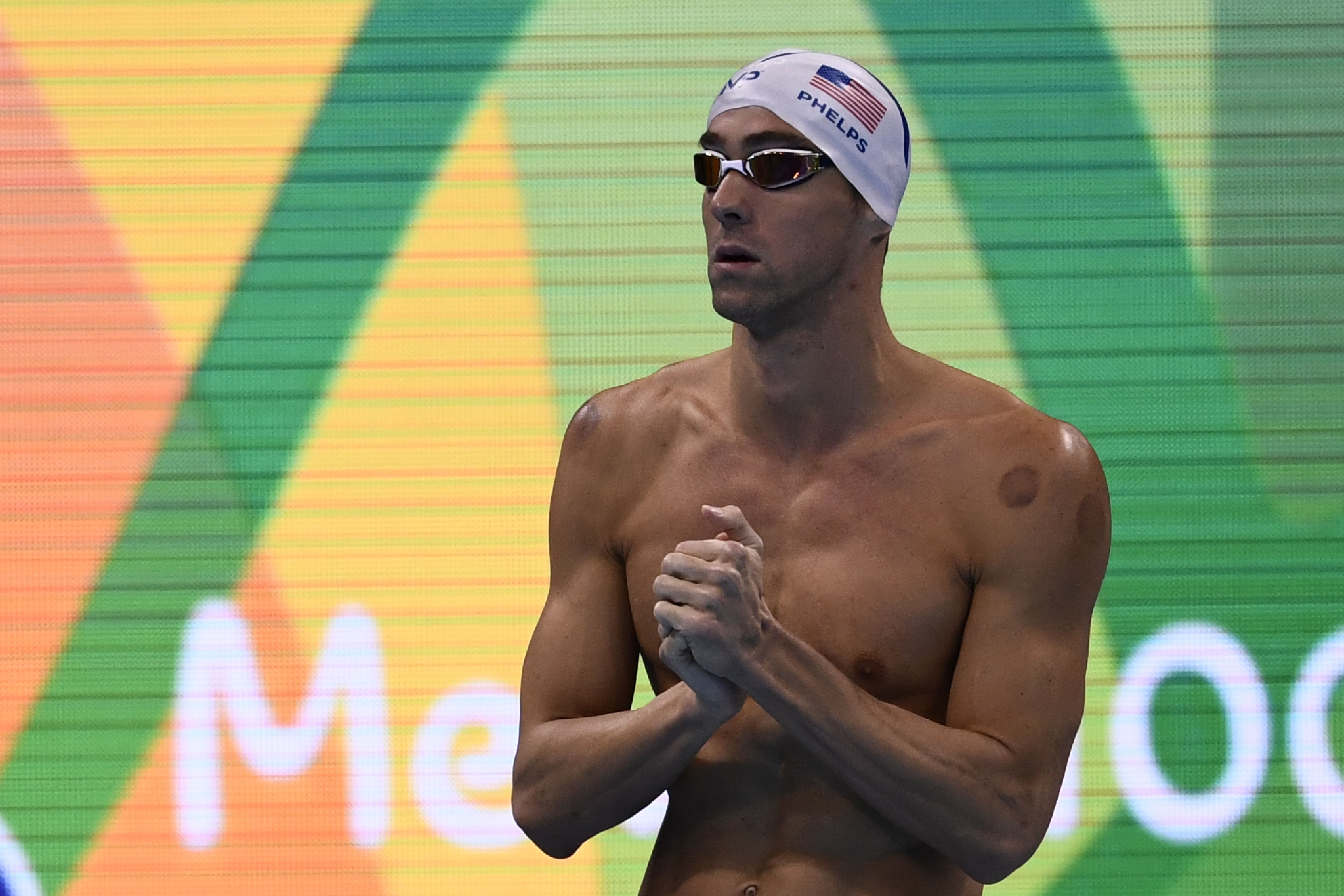 Michael Phelps prepares to compete in a Mens 100m Butterfly heat at the Rio 2016 Olympic Games in Rio de Janeiro on August 11, 2016. | Source: Getty Images