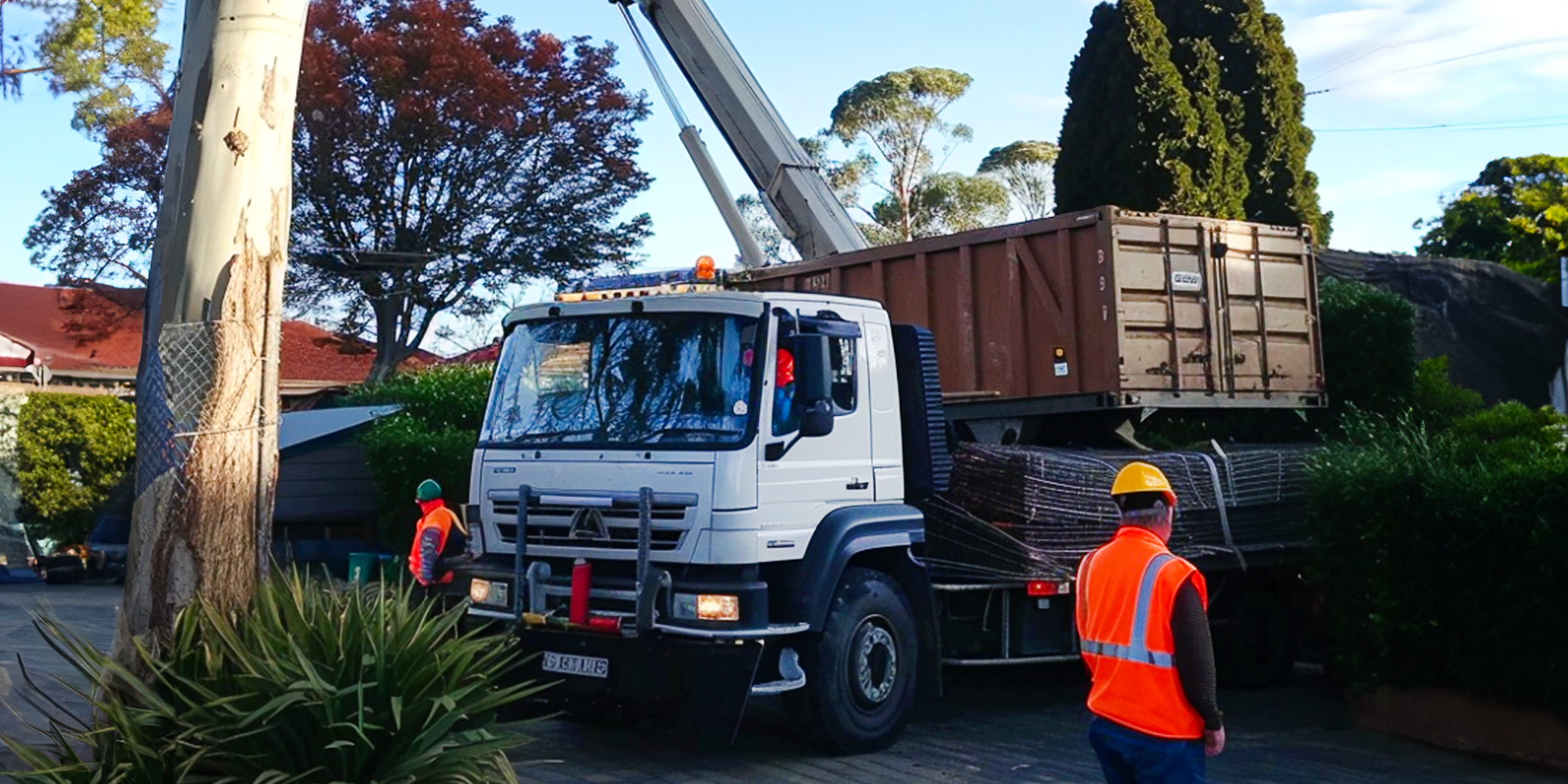 A construction vehicle parked on a suburban street | Source: Amomama