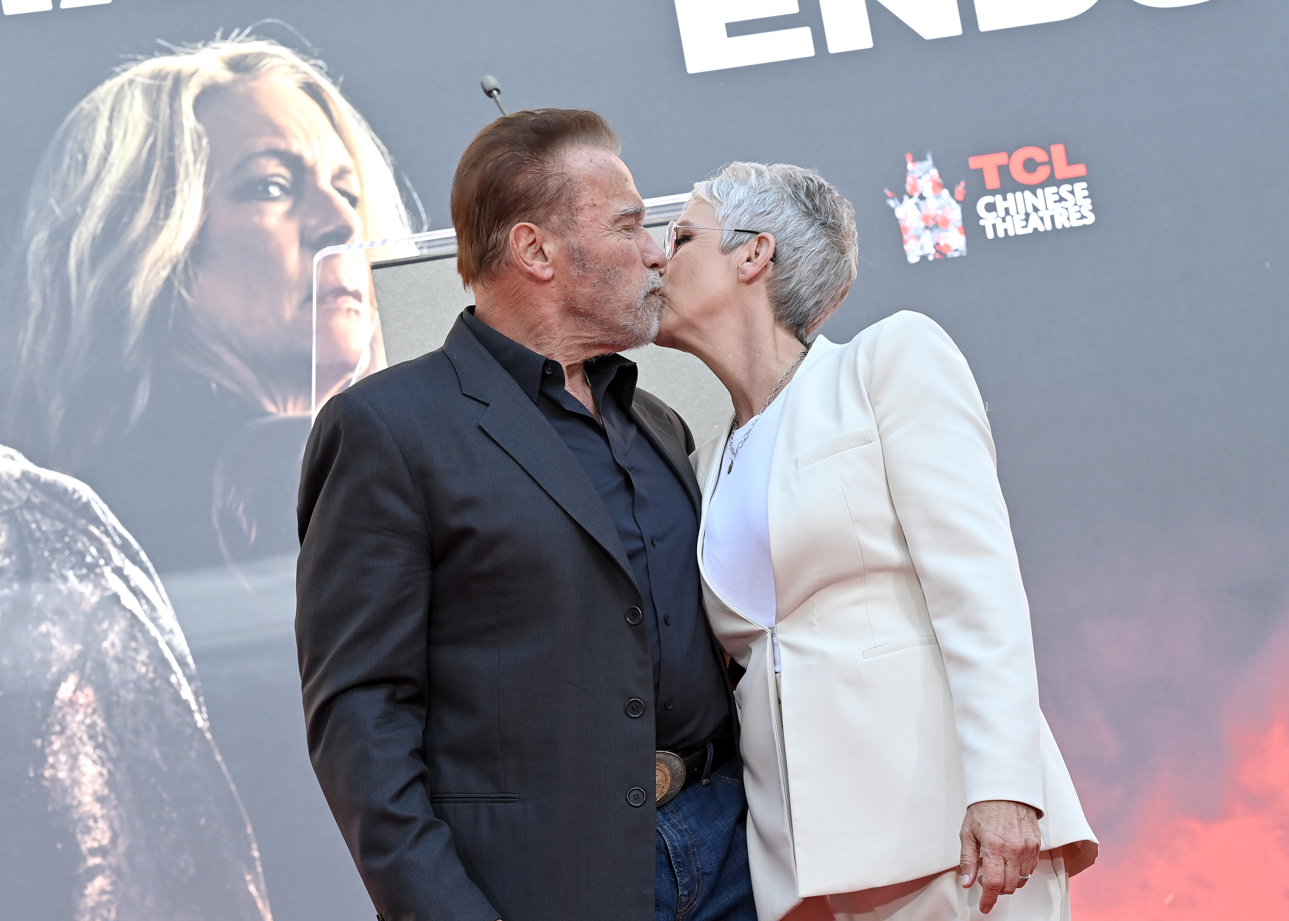 Arnold Schwarzenegger and Jamie Lee Curtis at the Jamie Lee Curtis Hand and Footprint Ceremony at TCL Chinese Theatre on October 12, 2022 in Hollywood, California. | Source: Getty Images