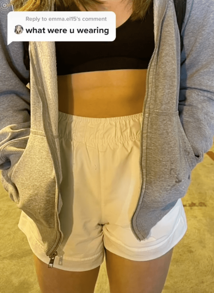 In a TikTok video woman shows viewers the outfit that allegedly almost got her kicked off of her flight | Photo: TikTok/sierrasteadman