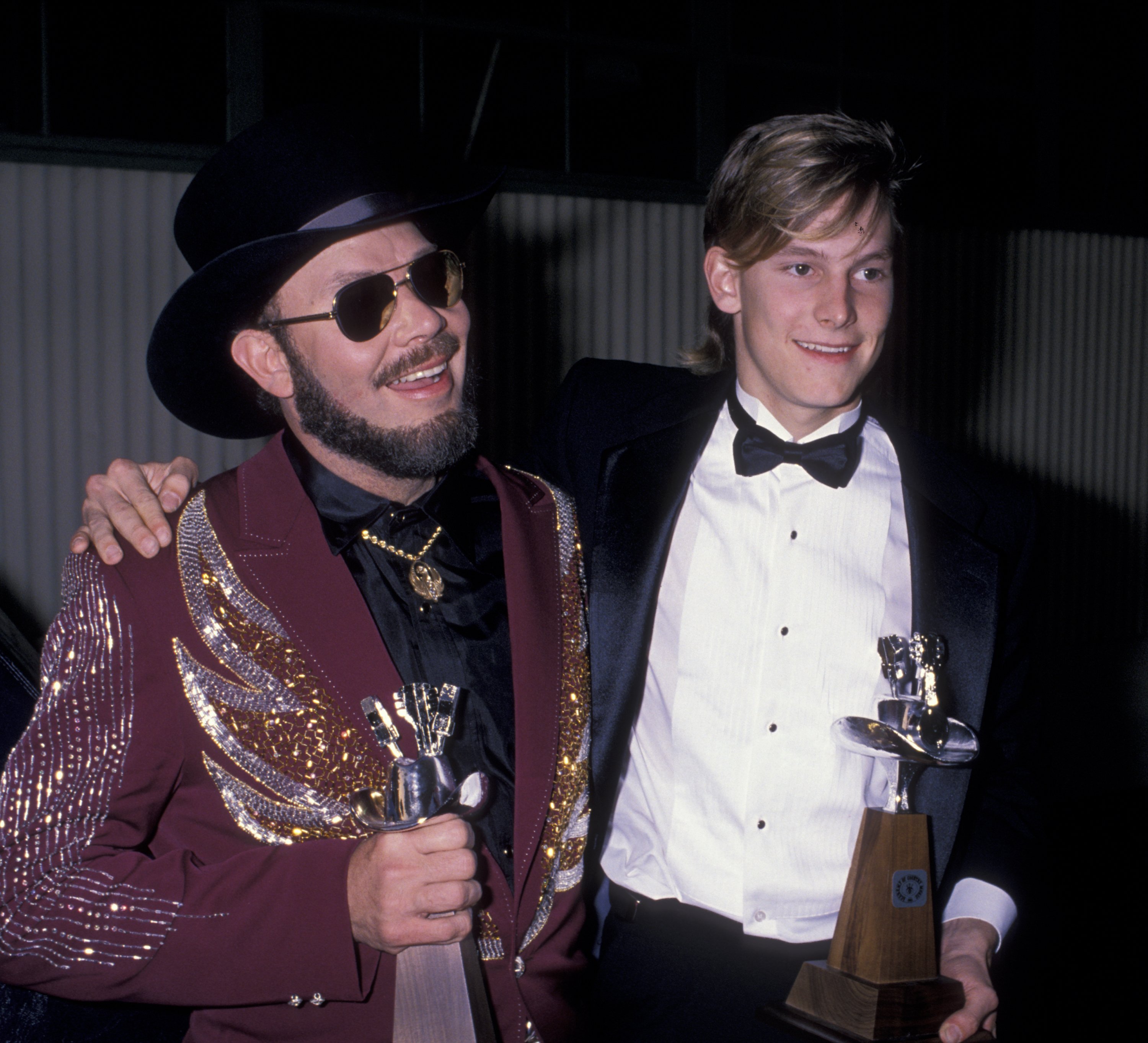 Hank Williams Jr. and Shelton Hank Williams III at the 24th Annual Academy of Country Music Awards on April 10, 1989, in Burbank, California. | Source: Getty Images
