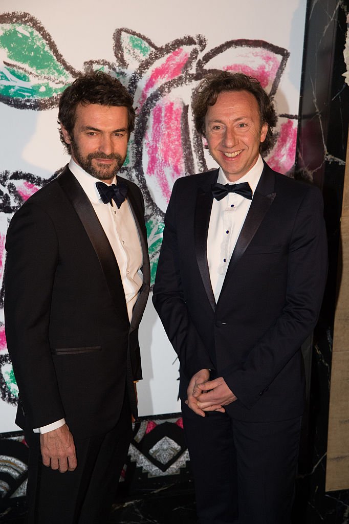 Stéphane Bern et Cyril Vergniol participent au Bal de la Rose 2015 au profit de la Fondation Princesse Grace au Sporting Monte-Carlo le 28 mars 2015 à Monte-Carlo, Monaco. | Photo : Getty Images