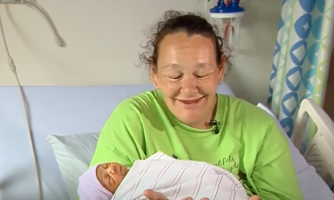 Christine Harvey and her baby girl, Miracle Joy. | Source: youtube.com/WCVB Channel 5 Boston