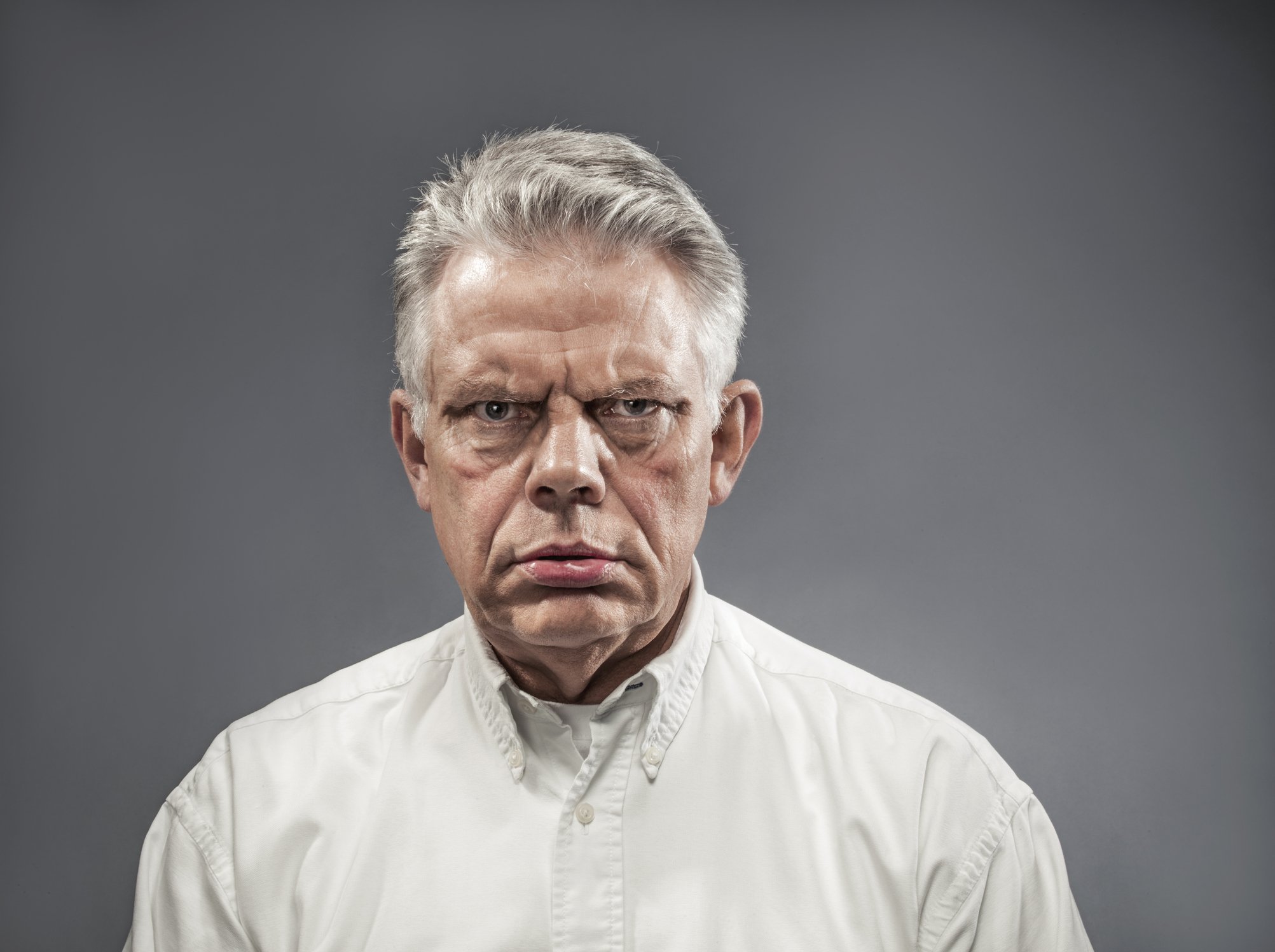 Portrait photo of an angry man. | Photo: Getty Images