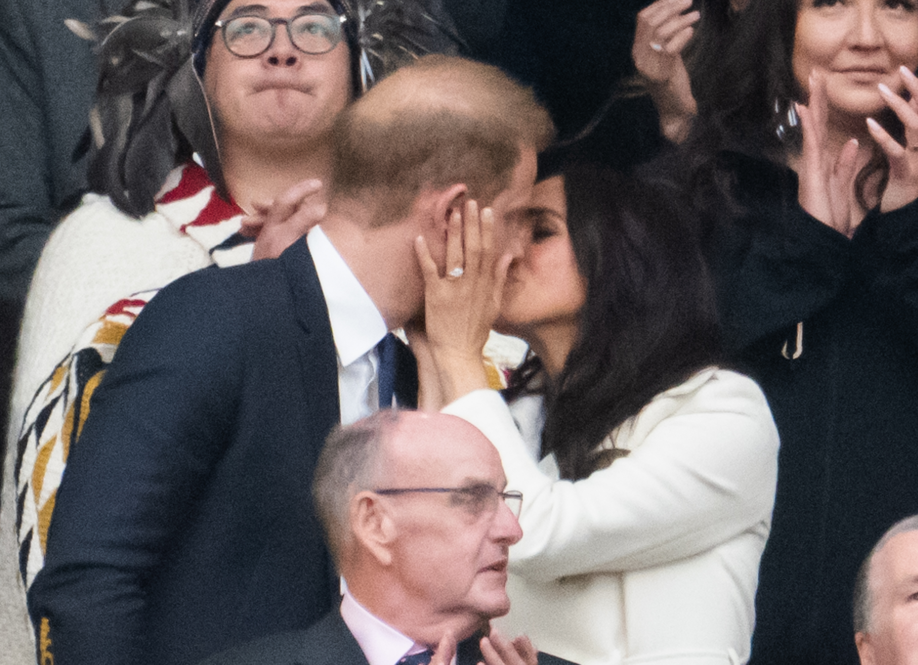 Prince Harry, and Megha Markle kiss during the opening ceremony of the 2025 Invictus Games | Source: Getty Images