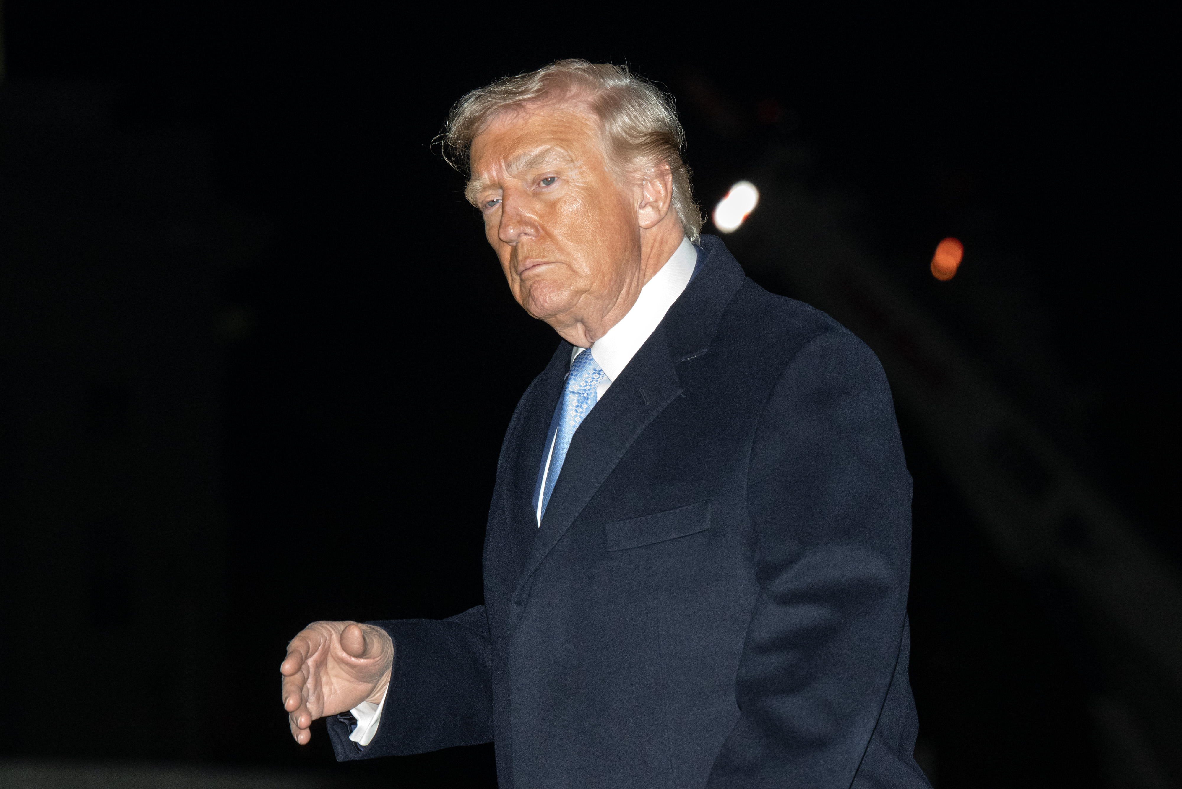 President Donald Trump walks on the South Lawn of the White House after arriving on Marine One in Washington, DC on November 16, 2025. | Source: Getty Images
