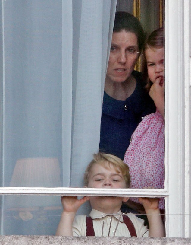 Prince George and Princess Charlotte photographed with their nanny Maria Teresa Borrallo from the window of Buckingham Palace on June 17, 2017 in London, England. / Source: Getty Images