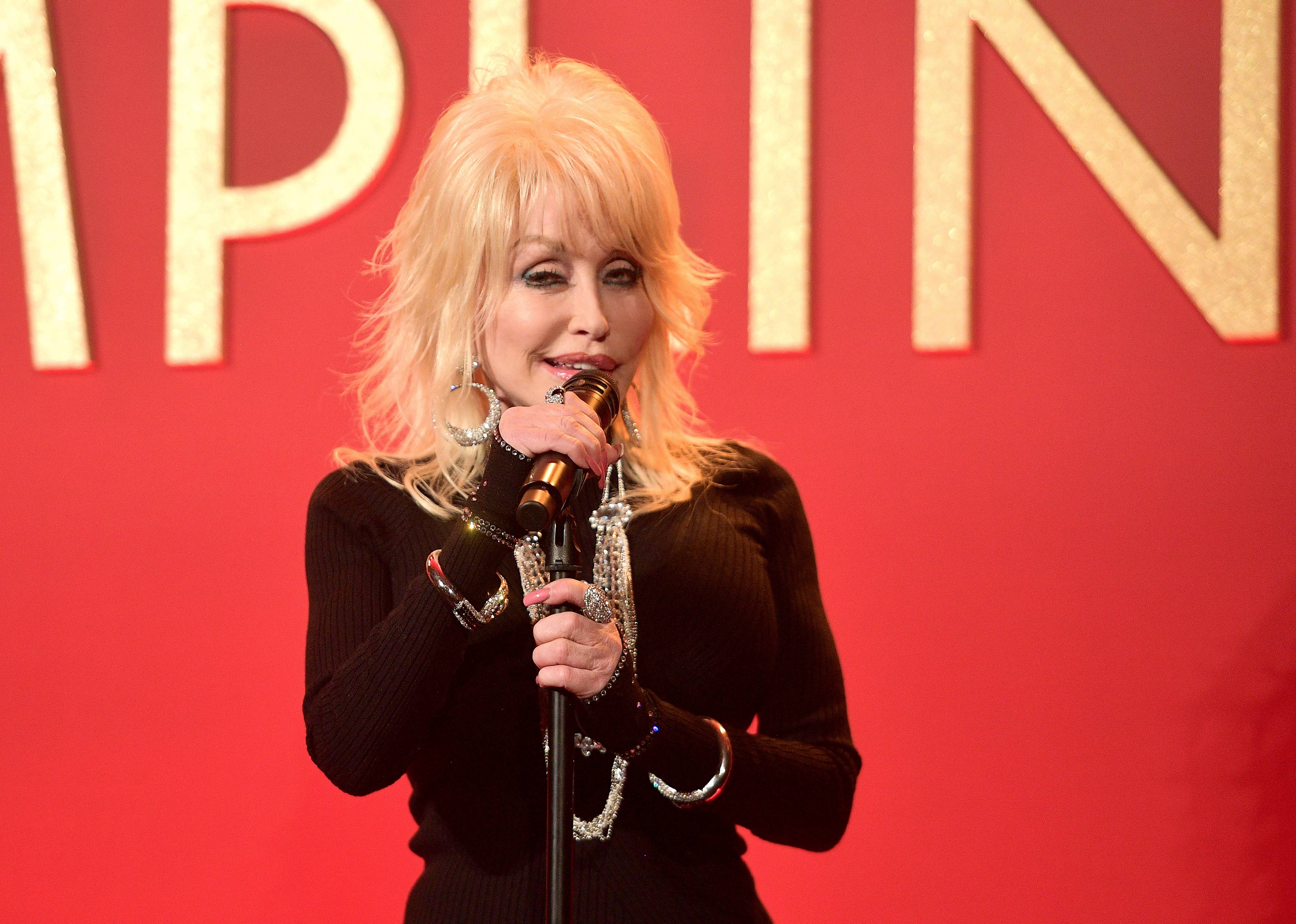 Dolly Parton performing at the luncheon for her Netflix movie, Dumplin | Photo: Getty Images