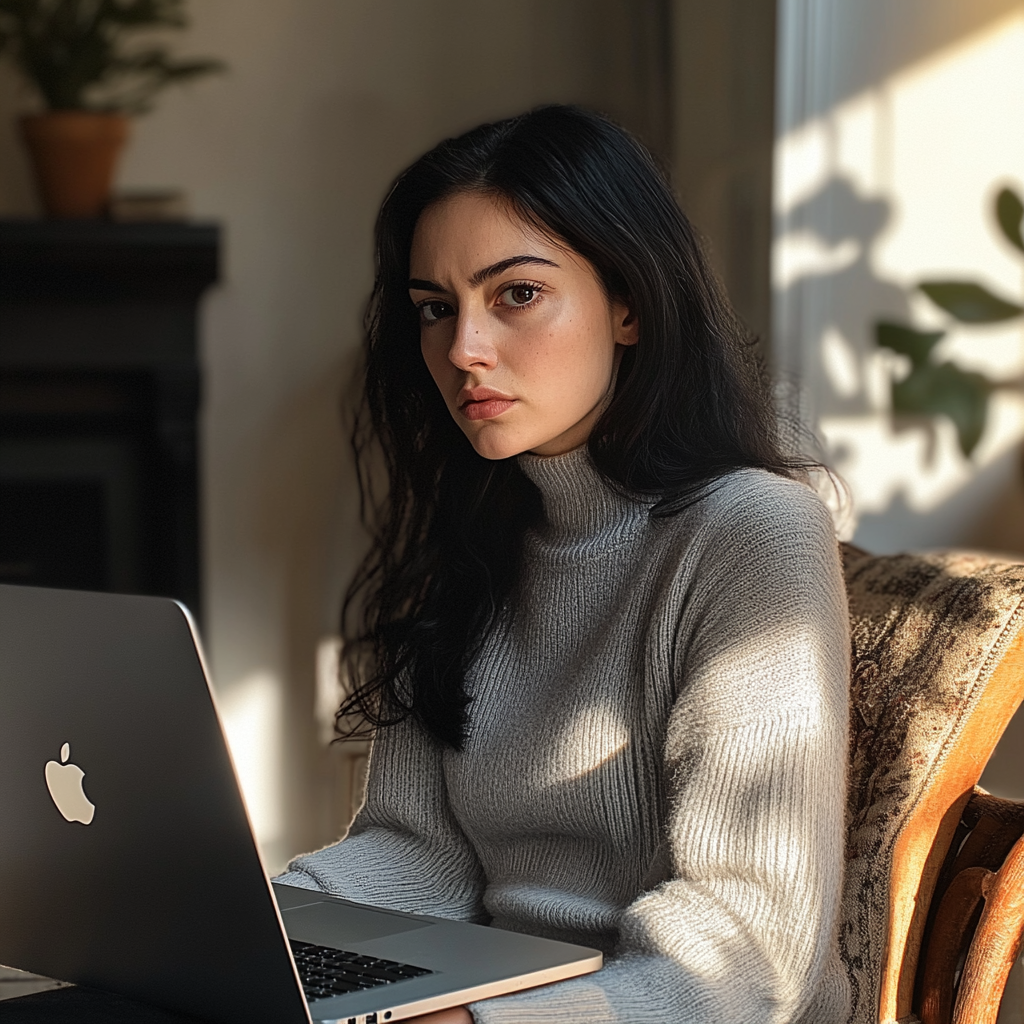 Exhausted woman turning away from her laptop | Source: Midjourney