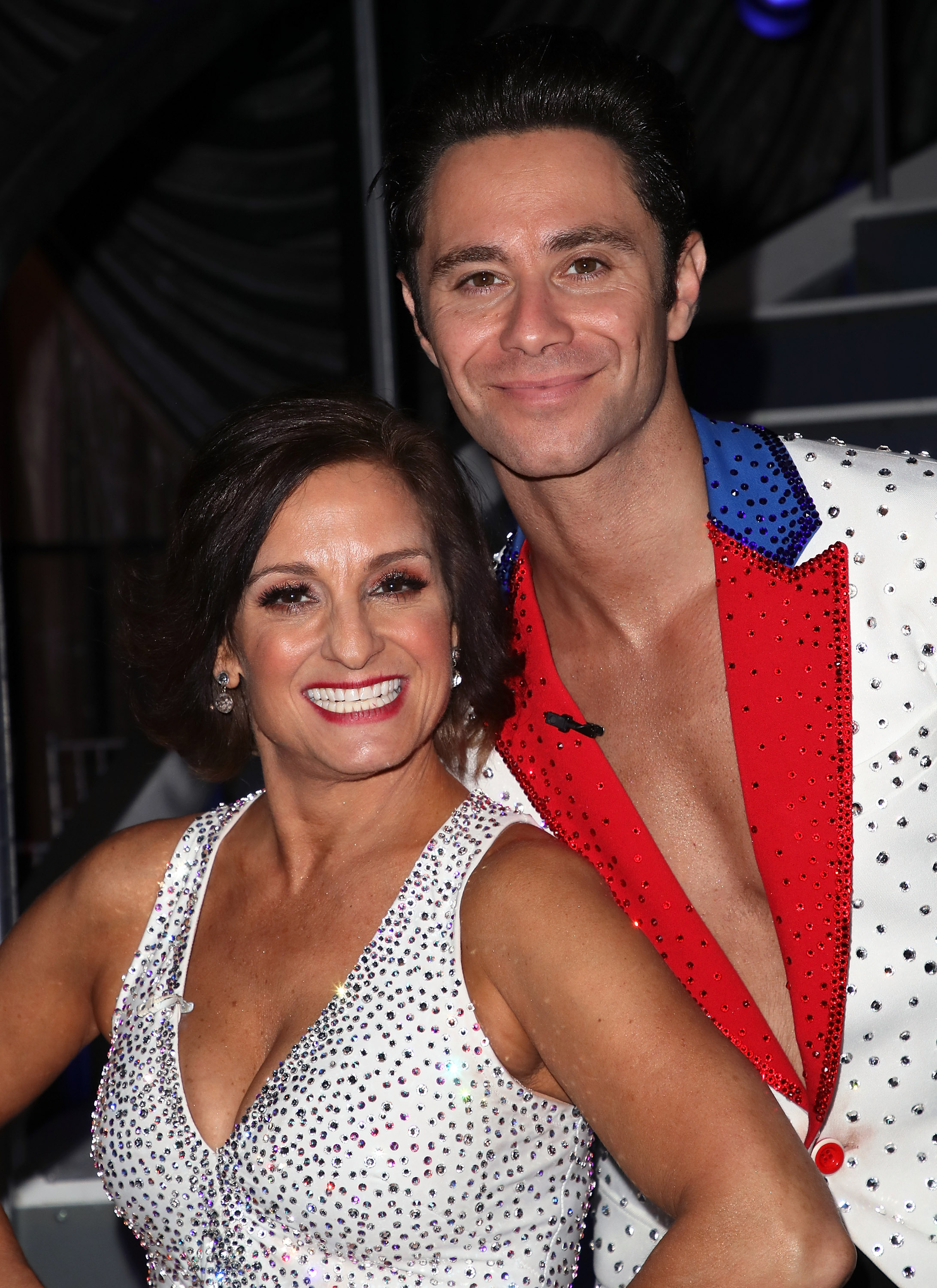Mary Lou Retton and Sasha Farber pose at "Dancing with the Stars" Season 27 at CBS Televison City on September 24, 2018, in Los Angeles, California. | Source: Getty Images