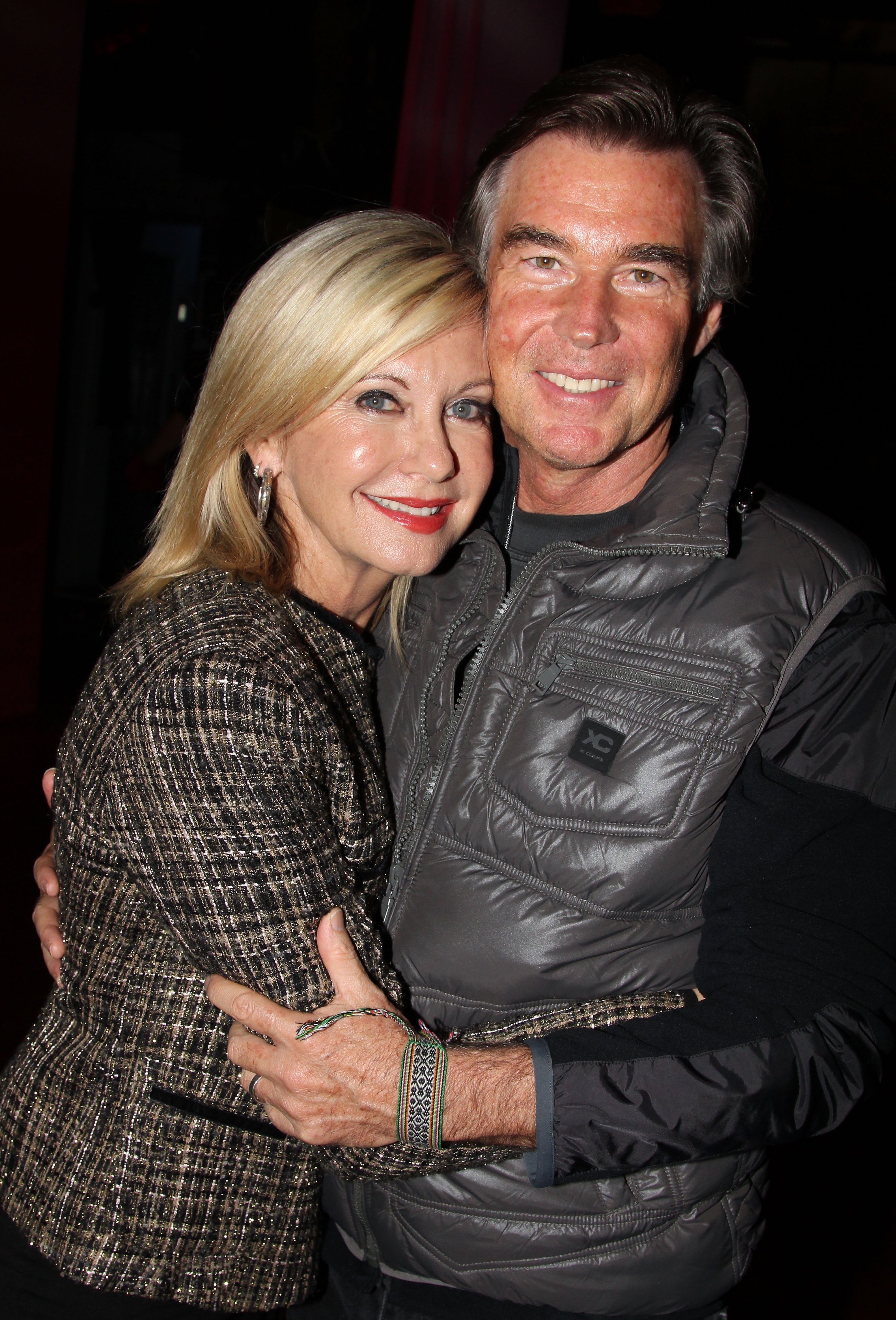 Olivia Newton-John and John Easterling attend the hit musical "Priscilla Queen of The Desert" on Broadway at the Palace Theater on December 6, 2011 in New York City. | Source: Getty Images