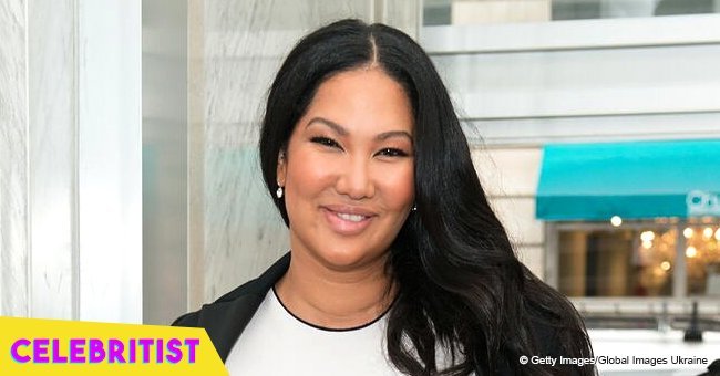 Kimora Lee Simmons defies her age in tight, red midi dress, posing with daughter at recent event