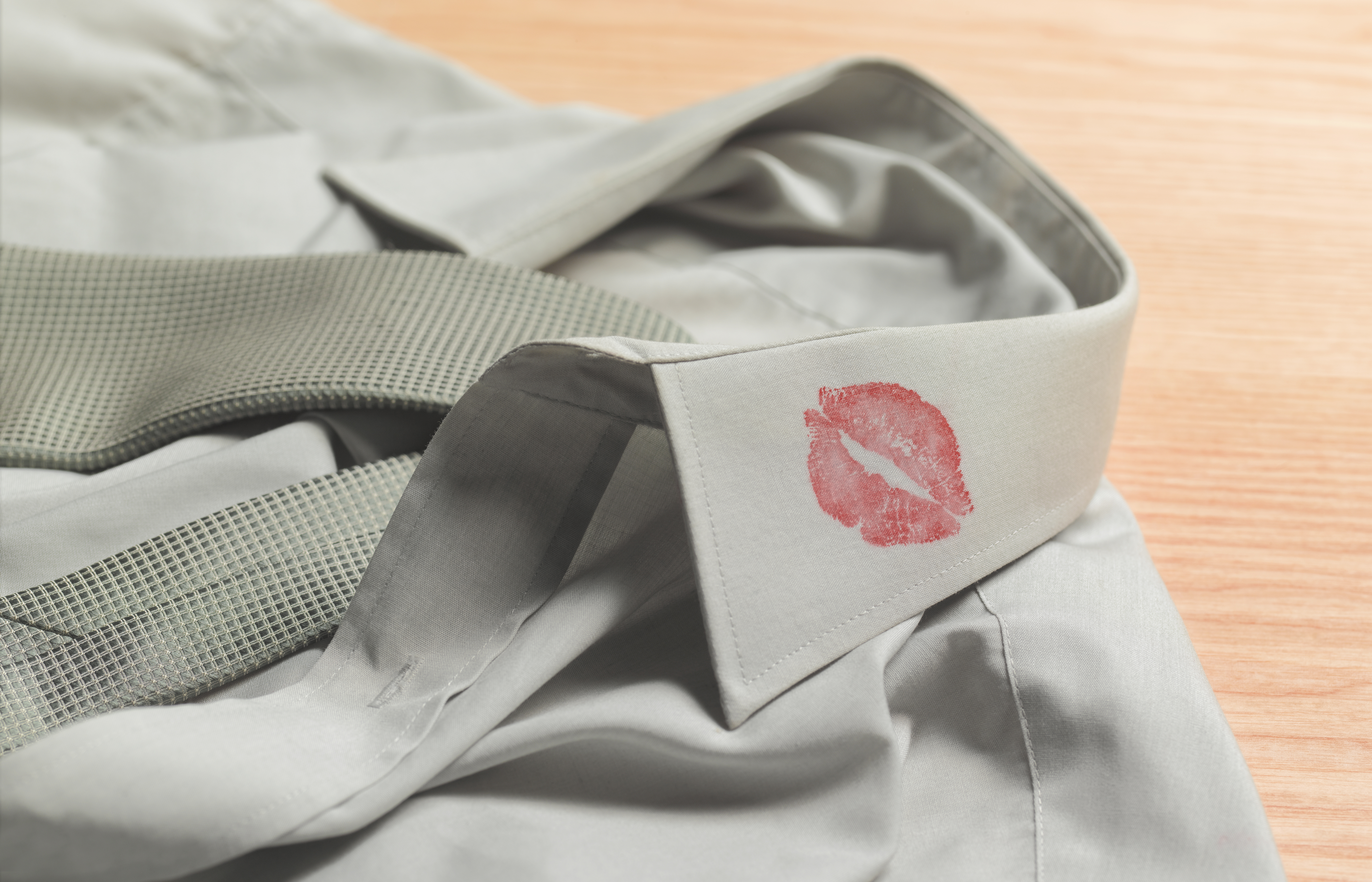 A shirt with a lipstick stain on the collar | Source: Getty Images
