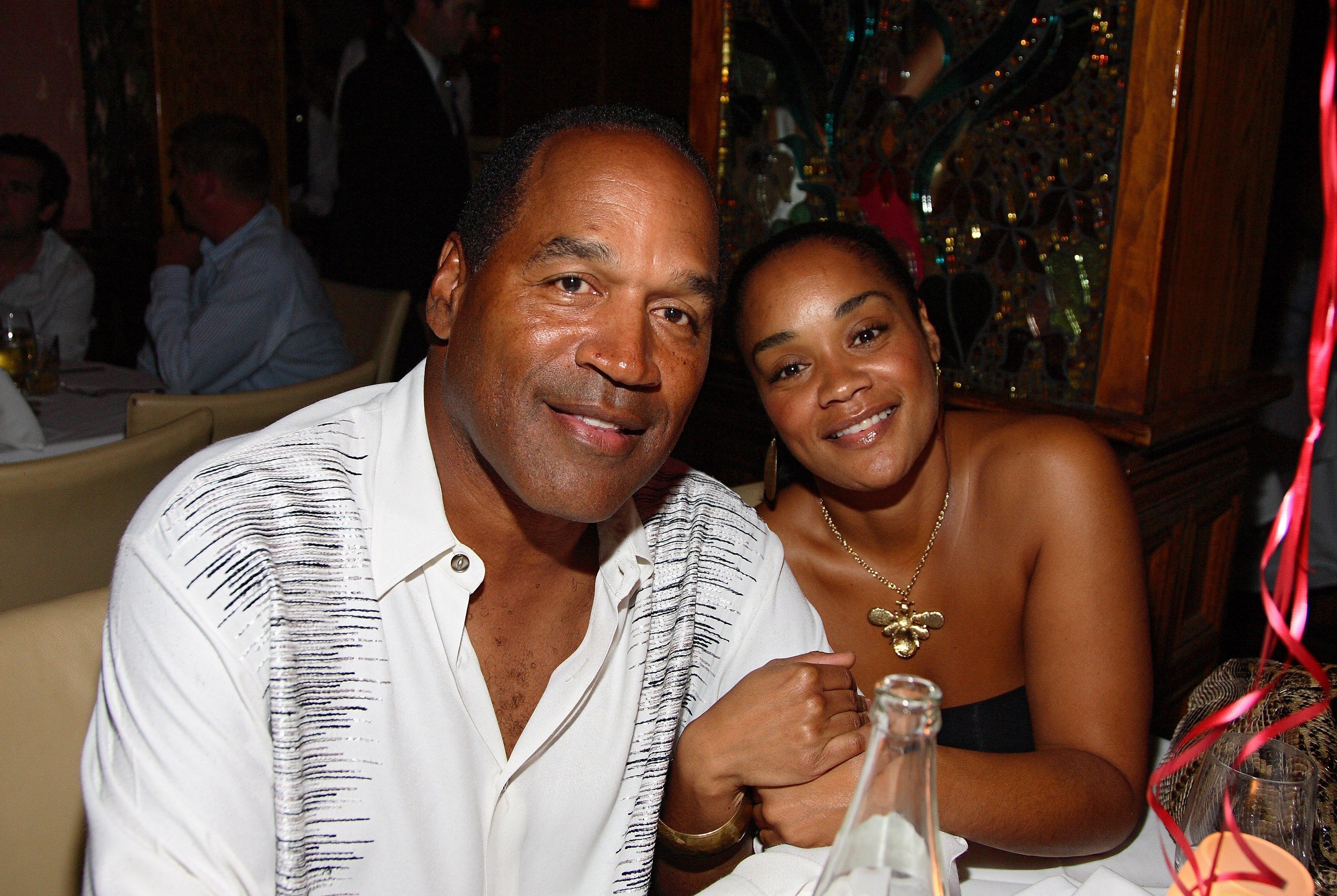O.J. Simpson and his daughter Arnelle Simpson at the Forge restaurant on June 20, 2007, in Miami Beach, Florida. | Source: Getty Images