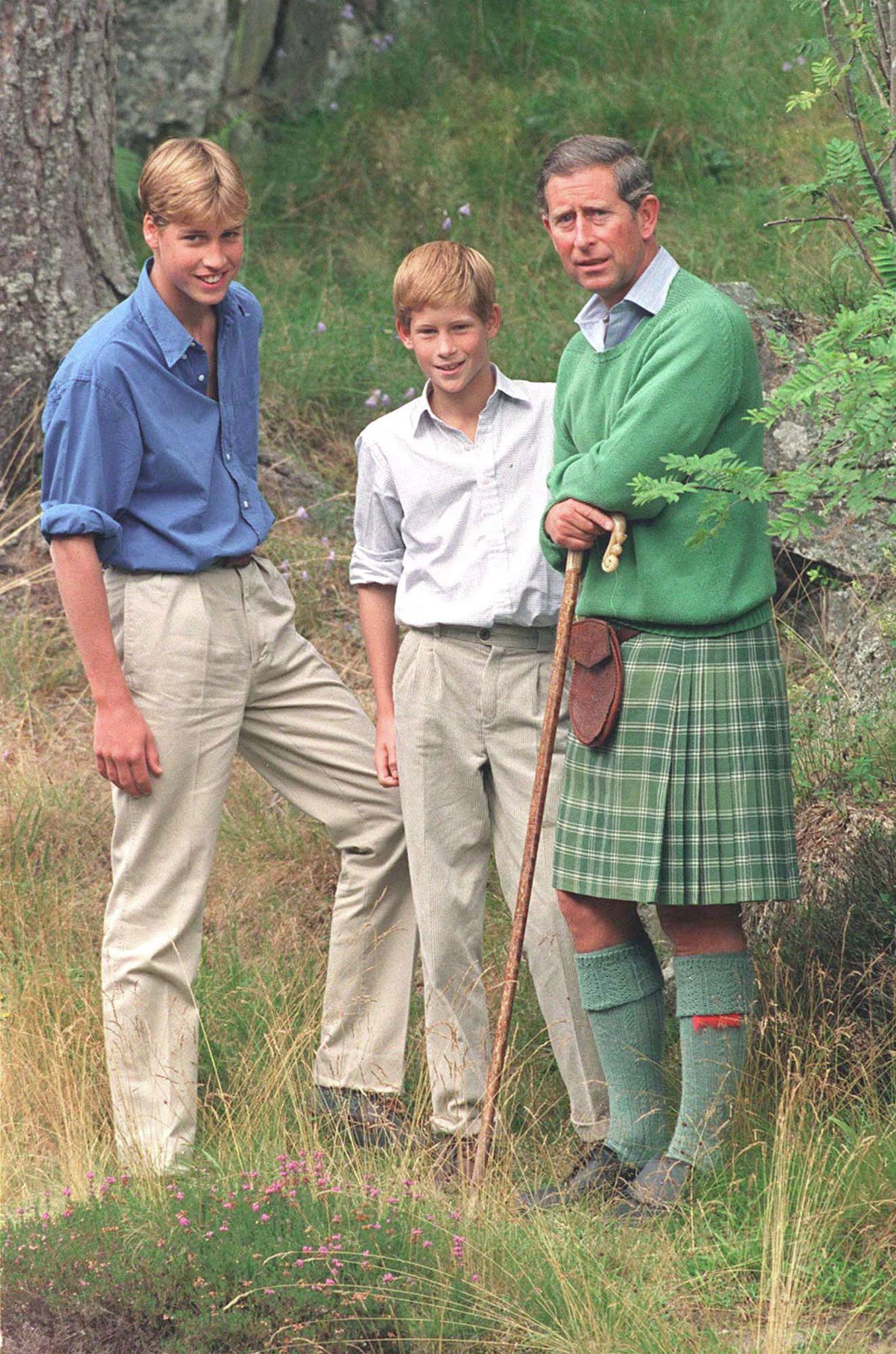 Prince William, Prince Harry, and Prince Charles at Balmoral, Scotland, on August 16, 1997 | Source: Getty Images