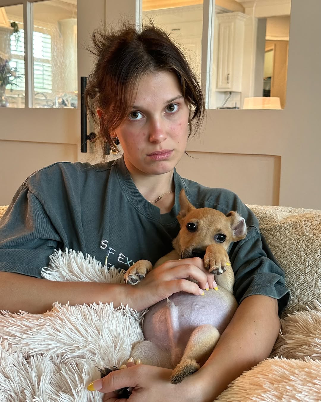 Millie Bobby Brown Bongiovi with one of her dogs from a post dated February 5, 2024. | Source: Instagram/milliebobbybrown