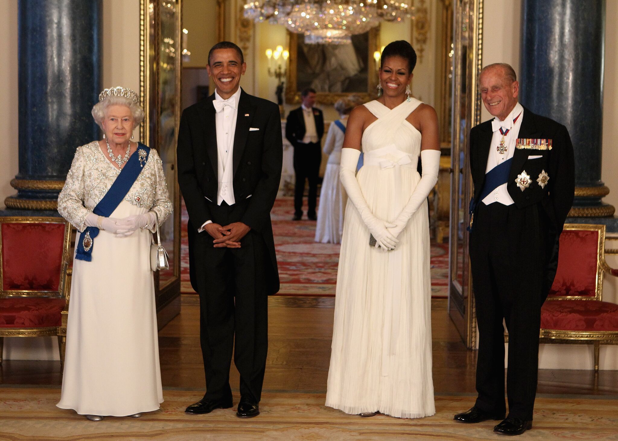  Queen Elizabeth II poses with U.S. President Barack Obama, his wife Michelle Obama and Prince Philip, Duke of Edinburgh in the Music Room of Buckingham Palace  | Getty Images