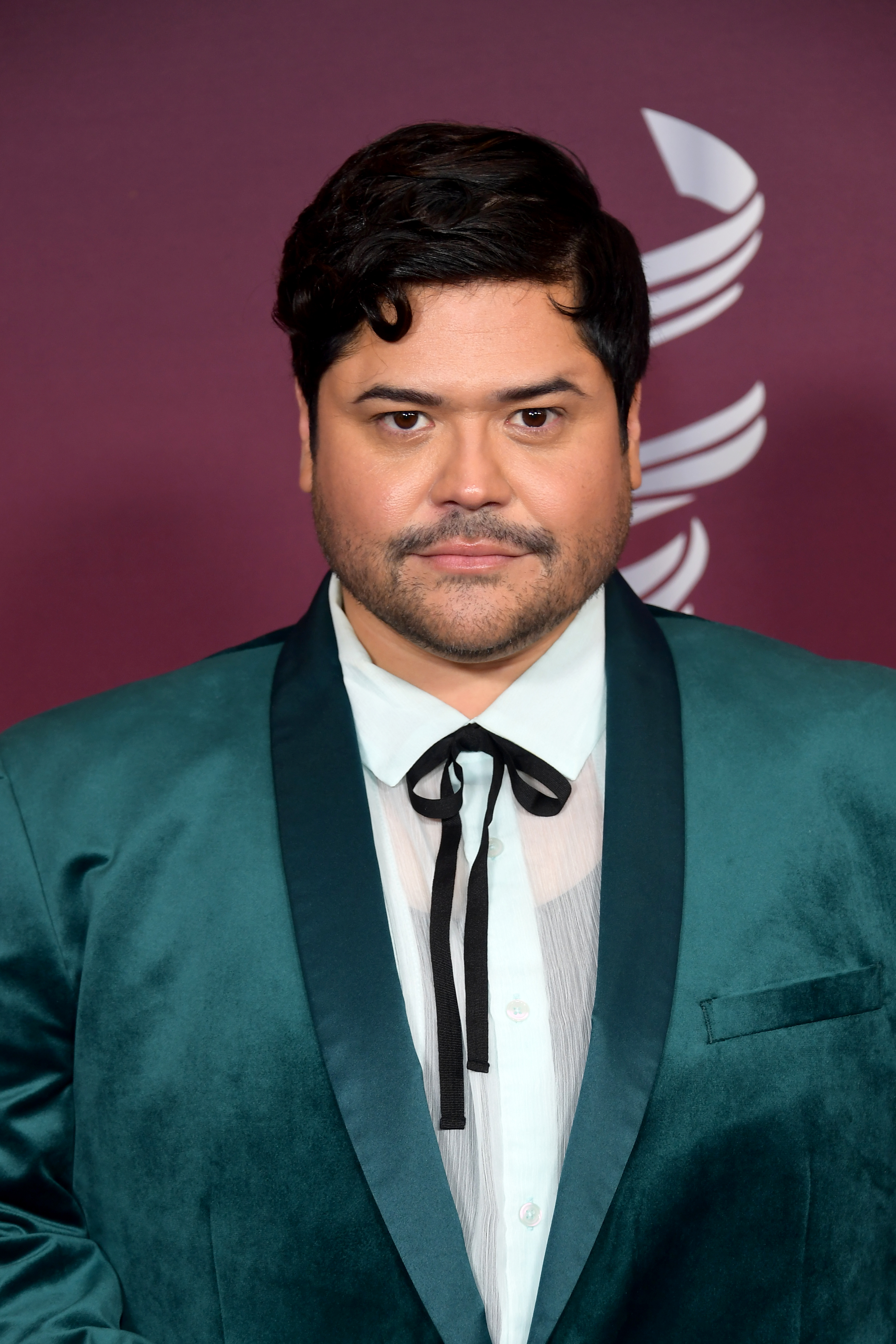 Harvey Guillen at the 25th Annual Costume Designers Guild Awards on February 27, 2023, in Los Angeles | Source: Getty Images