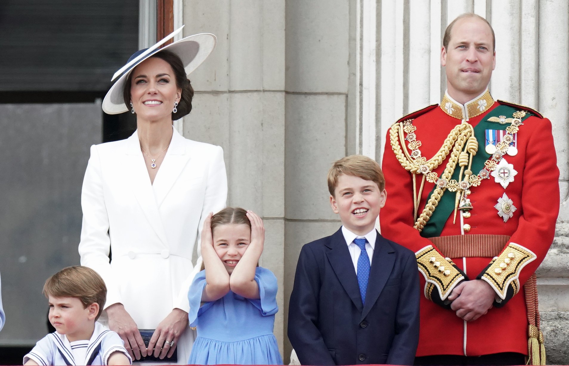 Prince Louis of Cambridge, Catherine, Duchess of Cambridge, Princess Charlotte of Cambridge, Prince George of Cambridge and Prince William, Duke of Cambridge watch the RAF flypast on the balcony of Buckingham Palace during the Trooping the Colour parade on June 02, 2022 in London, England. | Source: Getty Images