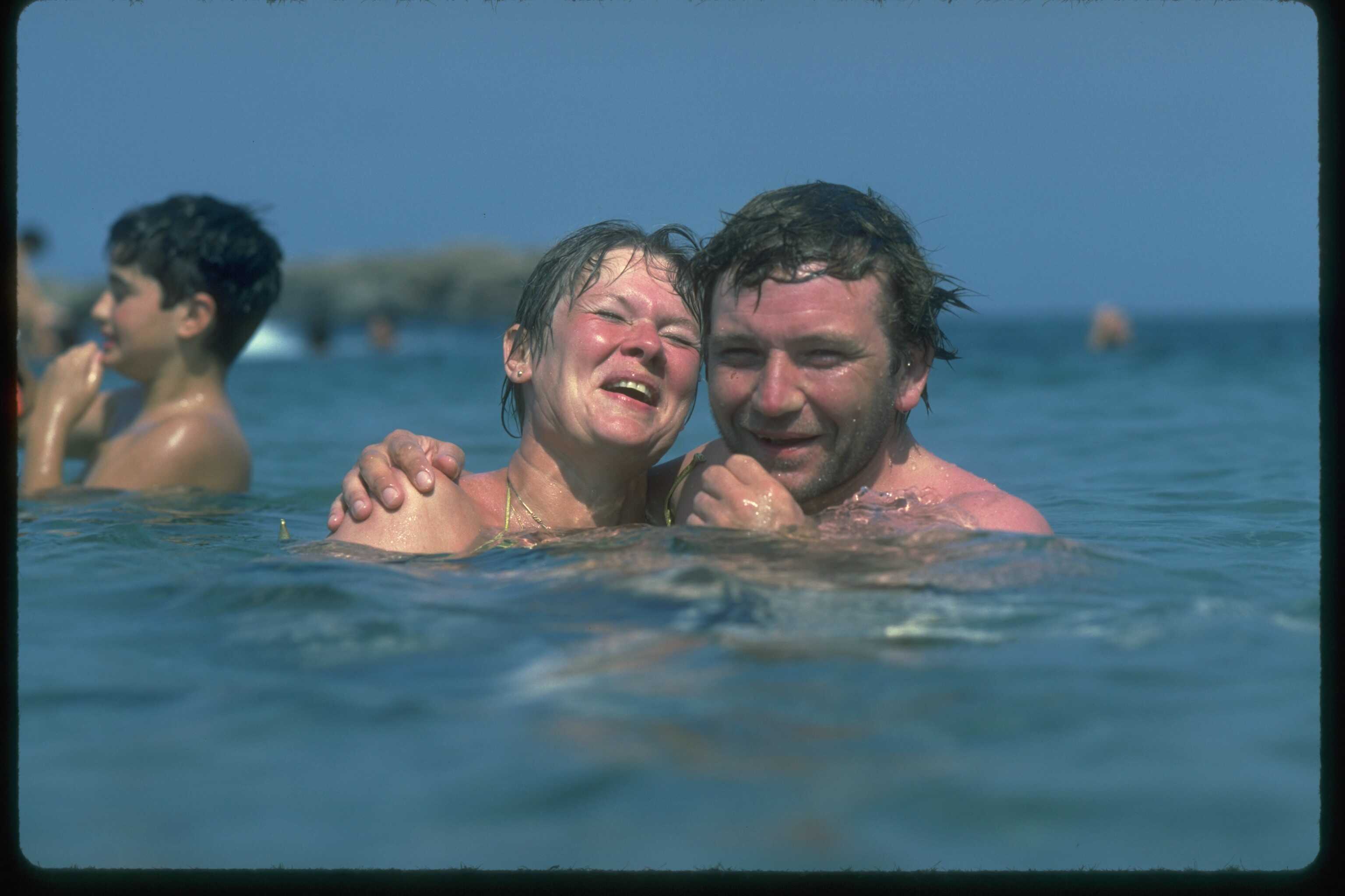 Judi Dench and husband Michael Williams swimming while on holiday in Cyprus, circa 1980 | Source: Getty Images