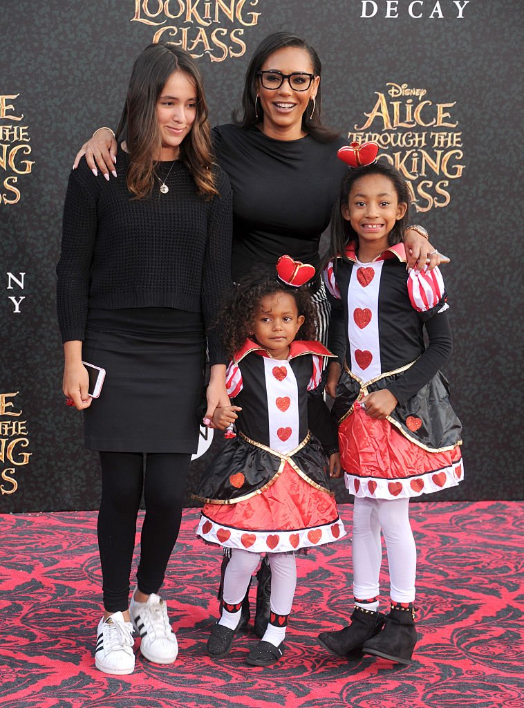 Singer Mel B and daughters arrive at the premiere of Disney's "Alice Through The Looking Glass" at the El Capitan Theatre on May 23, 2016. | Photo: Getty Images