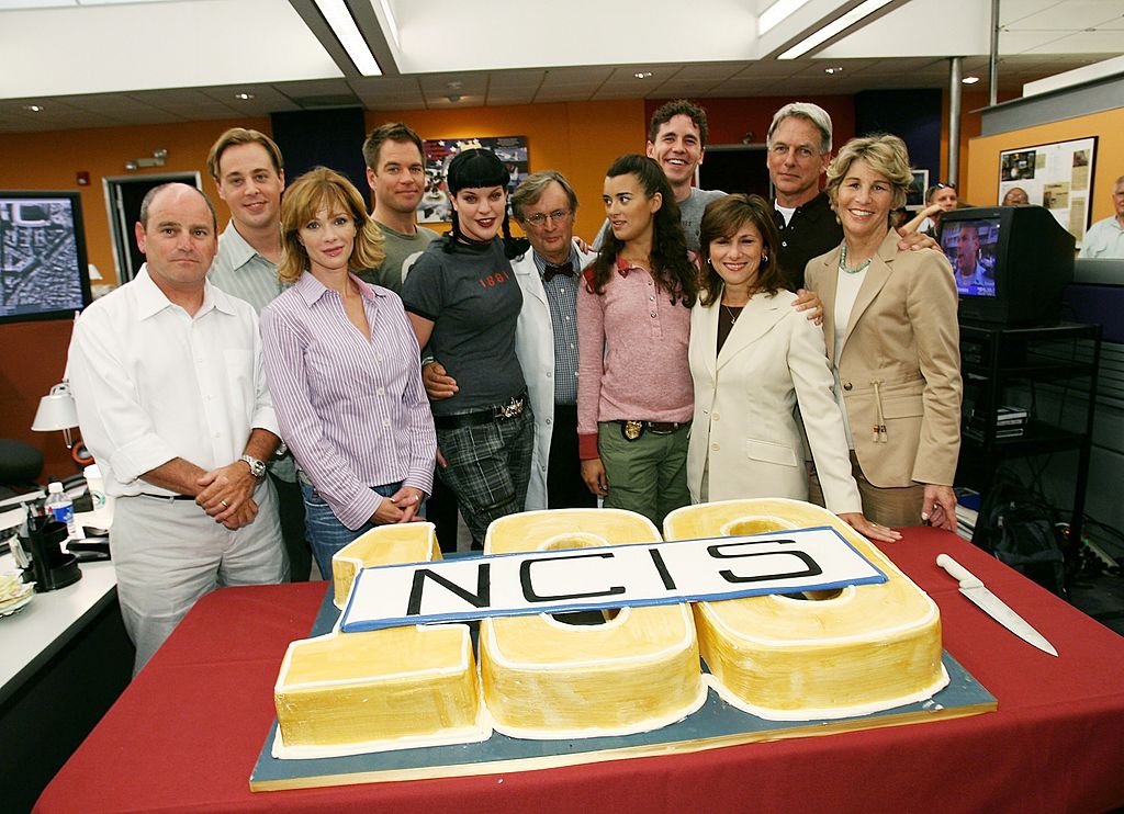 David Stapf President, CBS Paramount Network Television, actor Sean Murray, actress Lauren Holly, actor Michael Weatherly, actress Pauley Perrette, actor David McCallum, actress Cote de Pablo, actor Brian Dietzen, actor Mark Harmon, Nina Tessler, CBS Entertainment President and President of CBS Paramount Network Television Nancy Tellem attend the NCIS 100th Episode celebration at the Valencia Studios | Photo: Getty Images