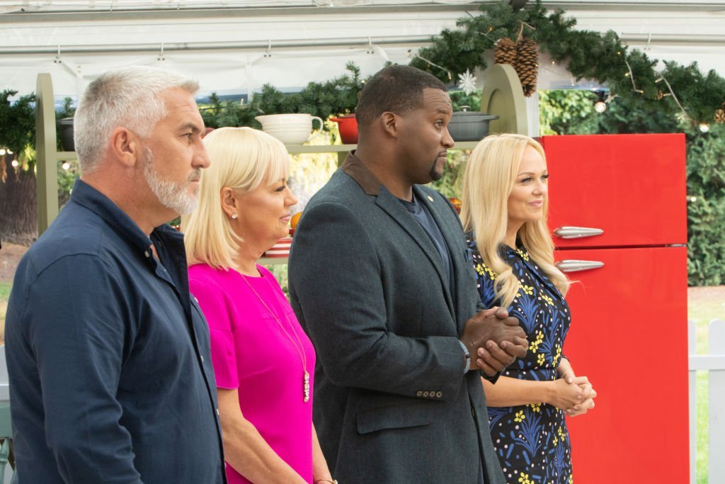 Paul Hollywood, Sherry Yard, Anthony “Spice” Adams and Emma Bunton stand before contestants on "The Great American Baking Show: Holiday Edition," on November 13, 2019 | Source: Mark Bourdillon via Getty Images