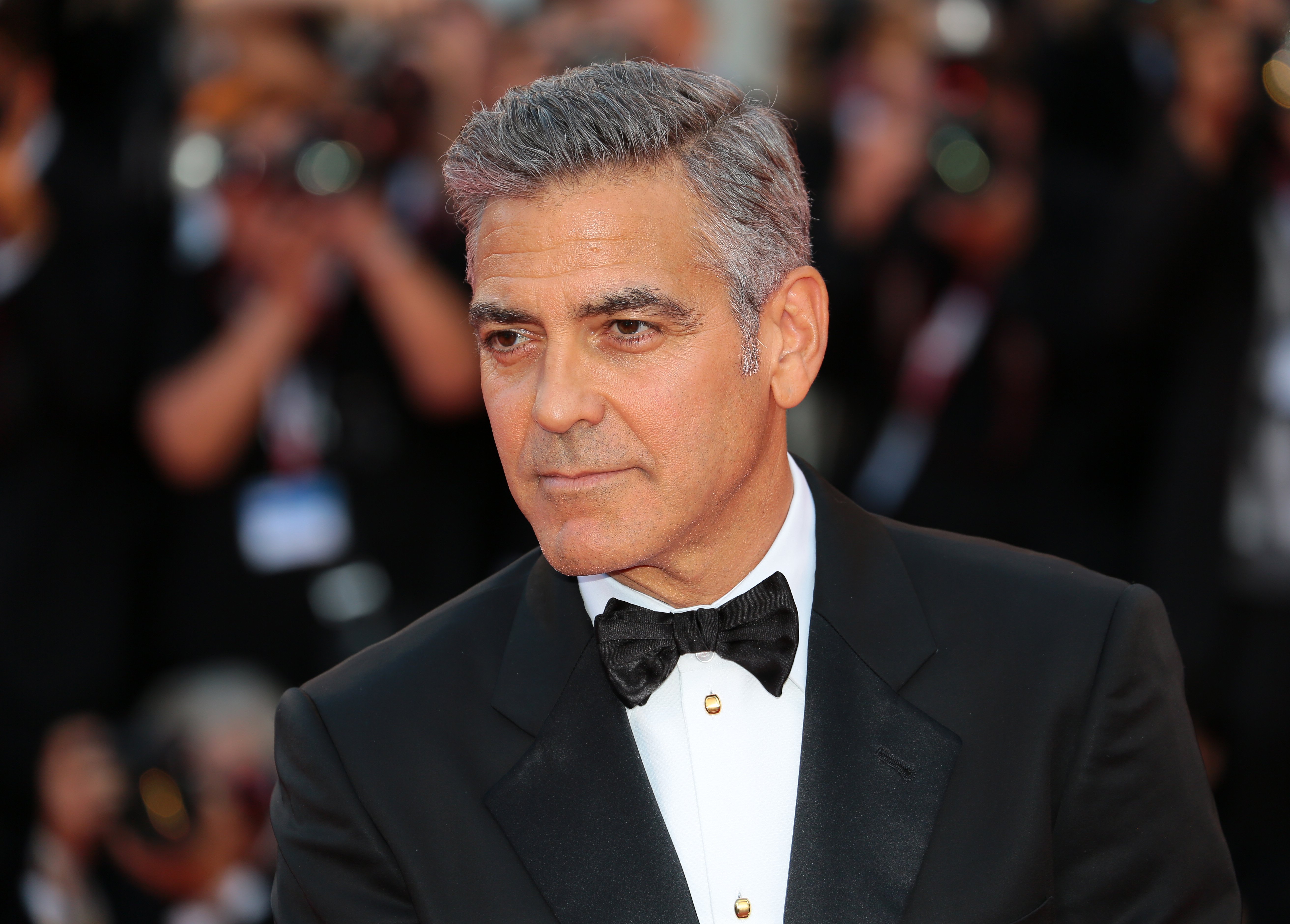 George Clooney looking dashing at the premiere of "Gravity', in Venice, August, 2012. | Photo: Shutterstock. 