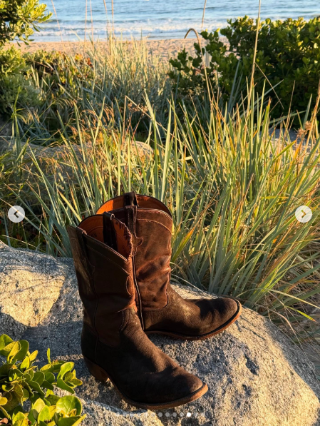 Cowboy boots pictured on a rock, dated August 2025 | Source: Instagram/orlandobloom