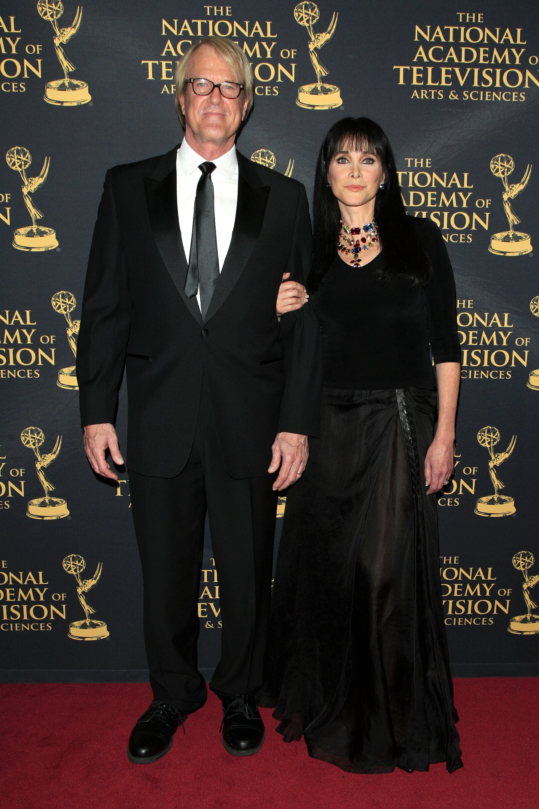 John Tesh and Connie Selleca attend The 42nd Daytime Creative Arts Emmy Awards Gala on April 24, 2015, in Los Angeles, California. | Source: Shutterstock.