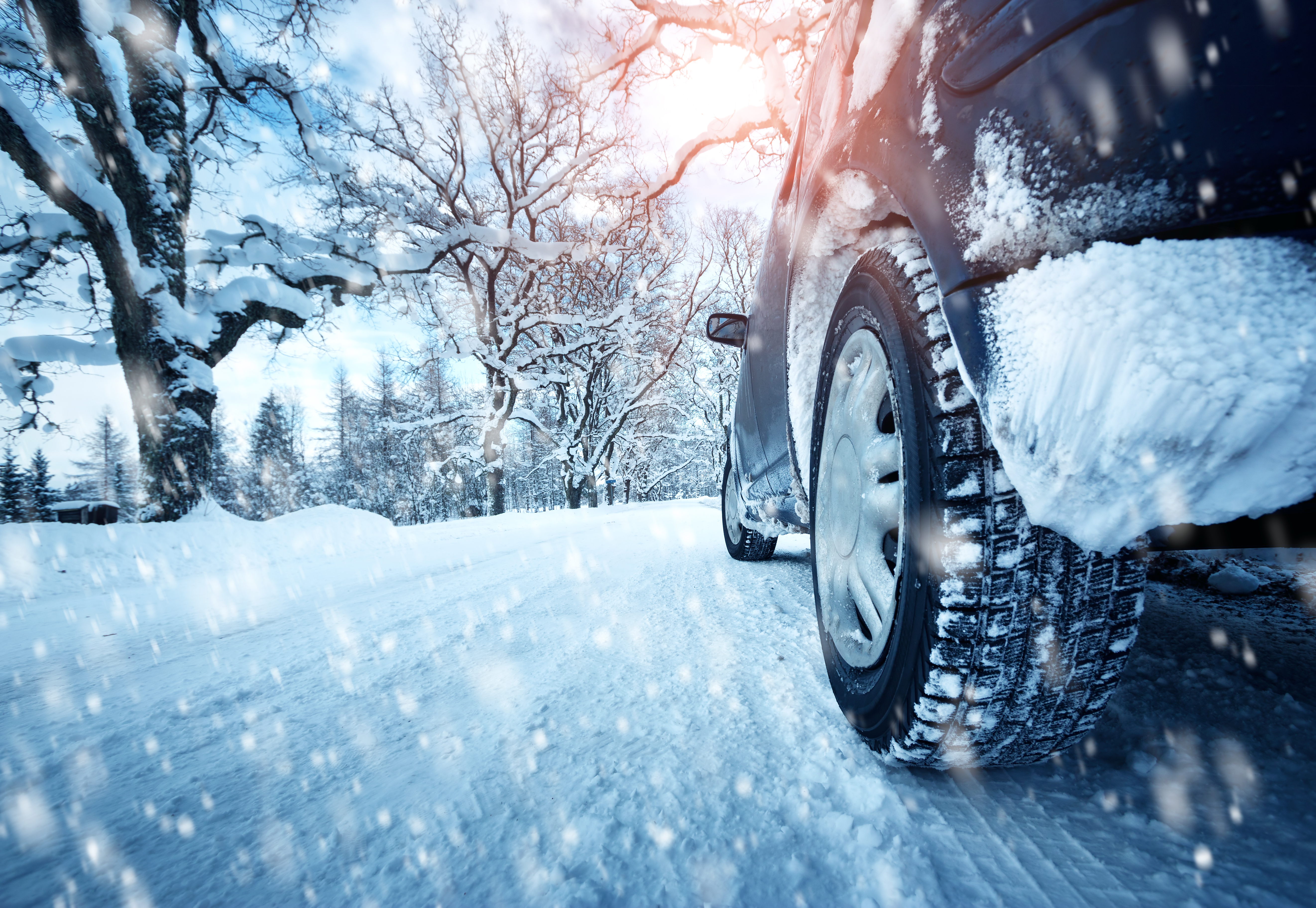 Car tires on winter road | Source: Shutterstock