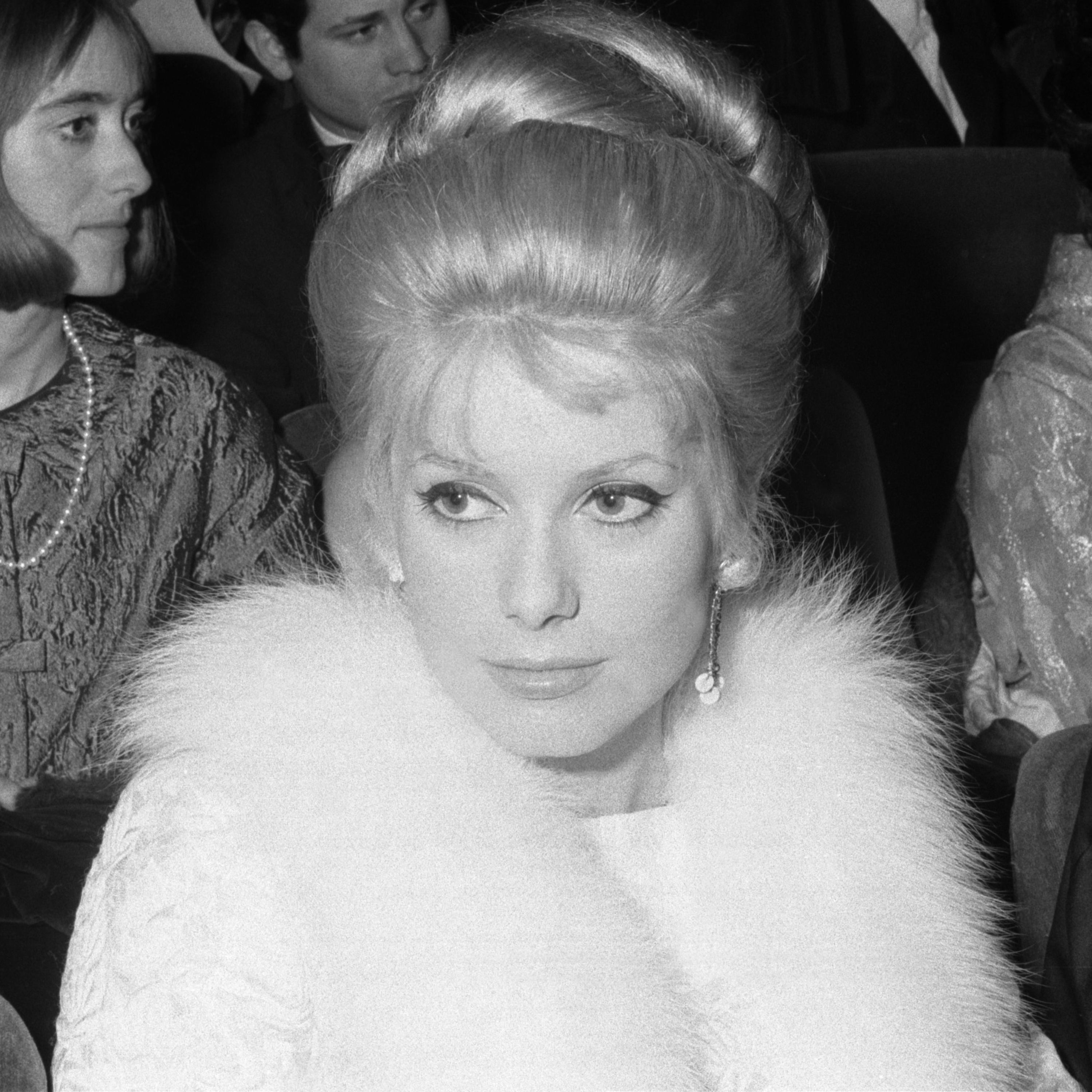 The actress among the spectators attending the concert of Sylvie Vartan and the Beatles to Olympia, circa 1964 | Source: Getty Images