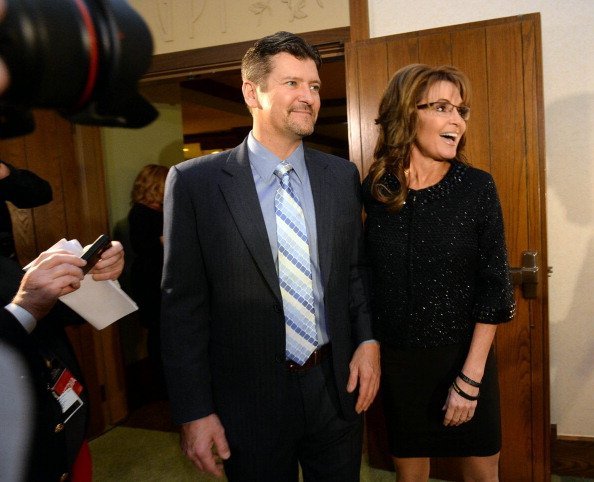 Sarah Palin, right, former Governor of Alaska, and her husband, Todd, arrive at the Grove Park Inn for a celebration of Billy Graham's 95th birthday in Asheville. | Photo: Getty Images.
