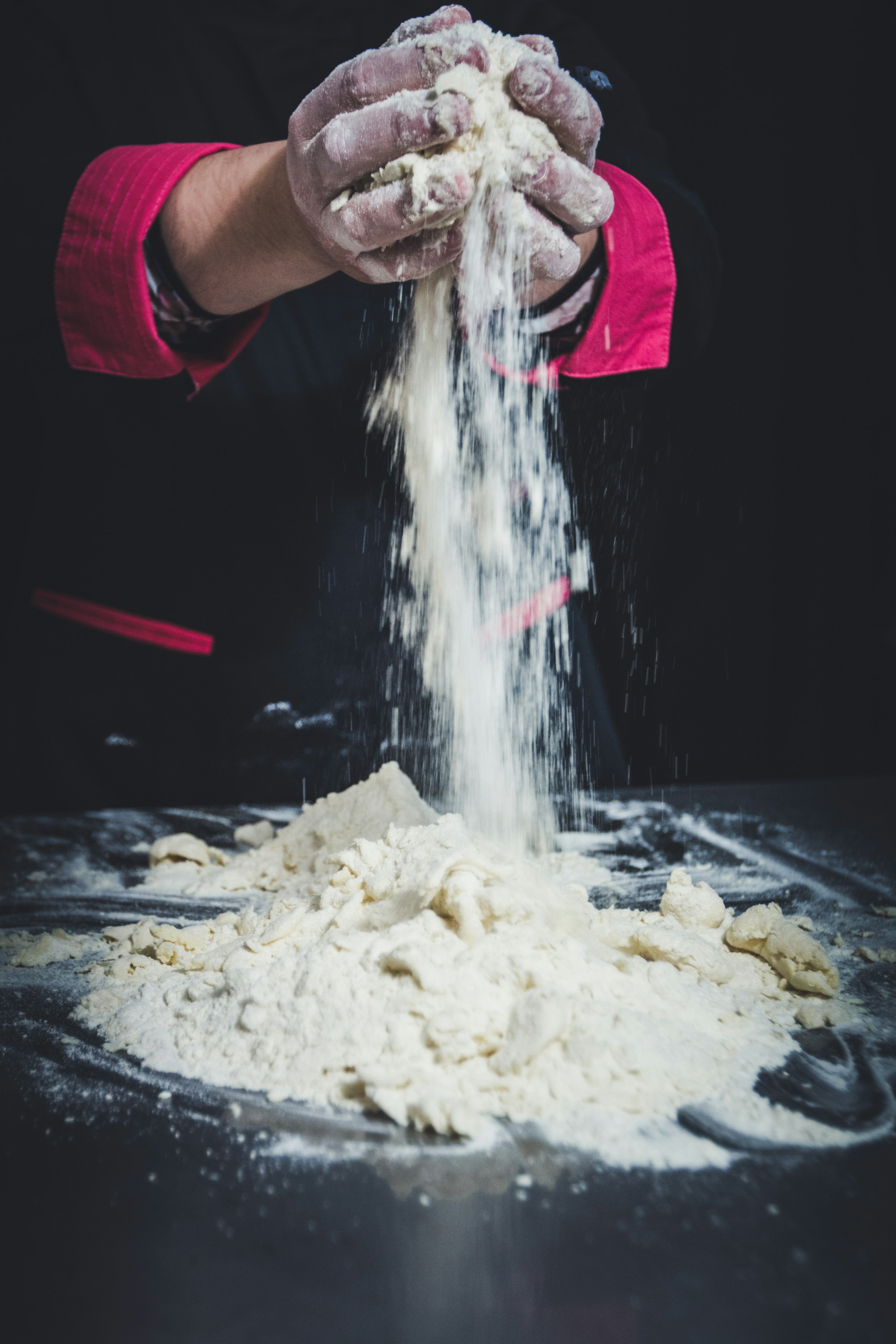 A person mixing dough | Source: Unsplash