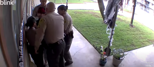 Cordova's son surrounded by Sheriff's deputies on October 22, 2022 | Source: youtube.com/@InsideEdition